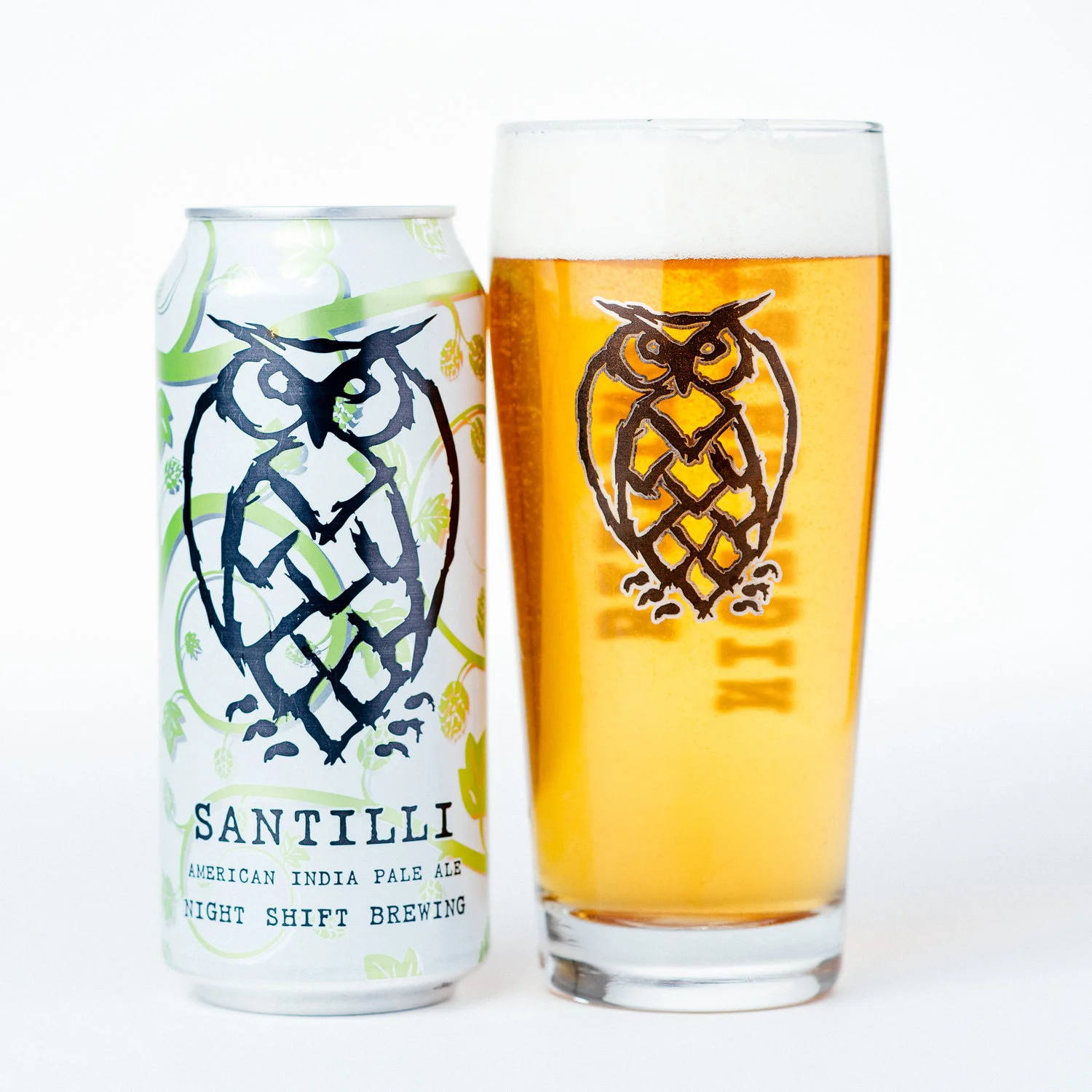 Santilli | 6.0% ABV | The Flagship IPA for Night Shift. The recipe for Santilli was born out of a batch of Morph, one of Night Shift's rotating IPA series. Santilli is packed with notes of pine and orange zest with a crisp finish. An excellent pairing with sharp cheeses and spiced meats.
