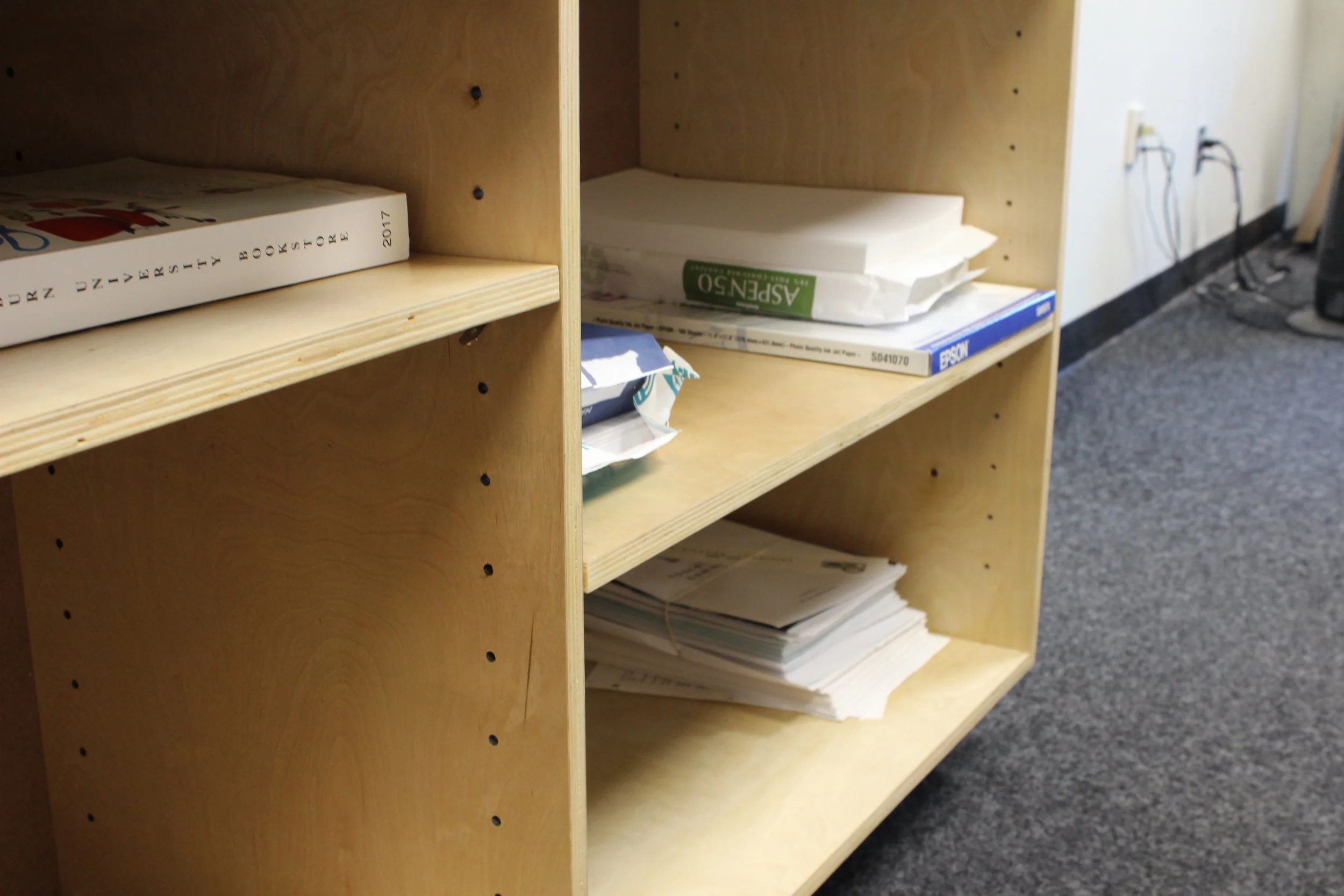  The design included adjustable shelves so that they could determine how the storage was organized. I also used an inset foot to make the piece appear lighter and to give it some visual interest. 