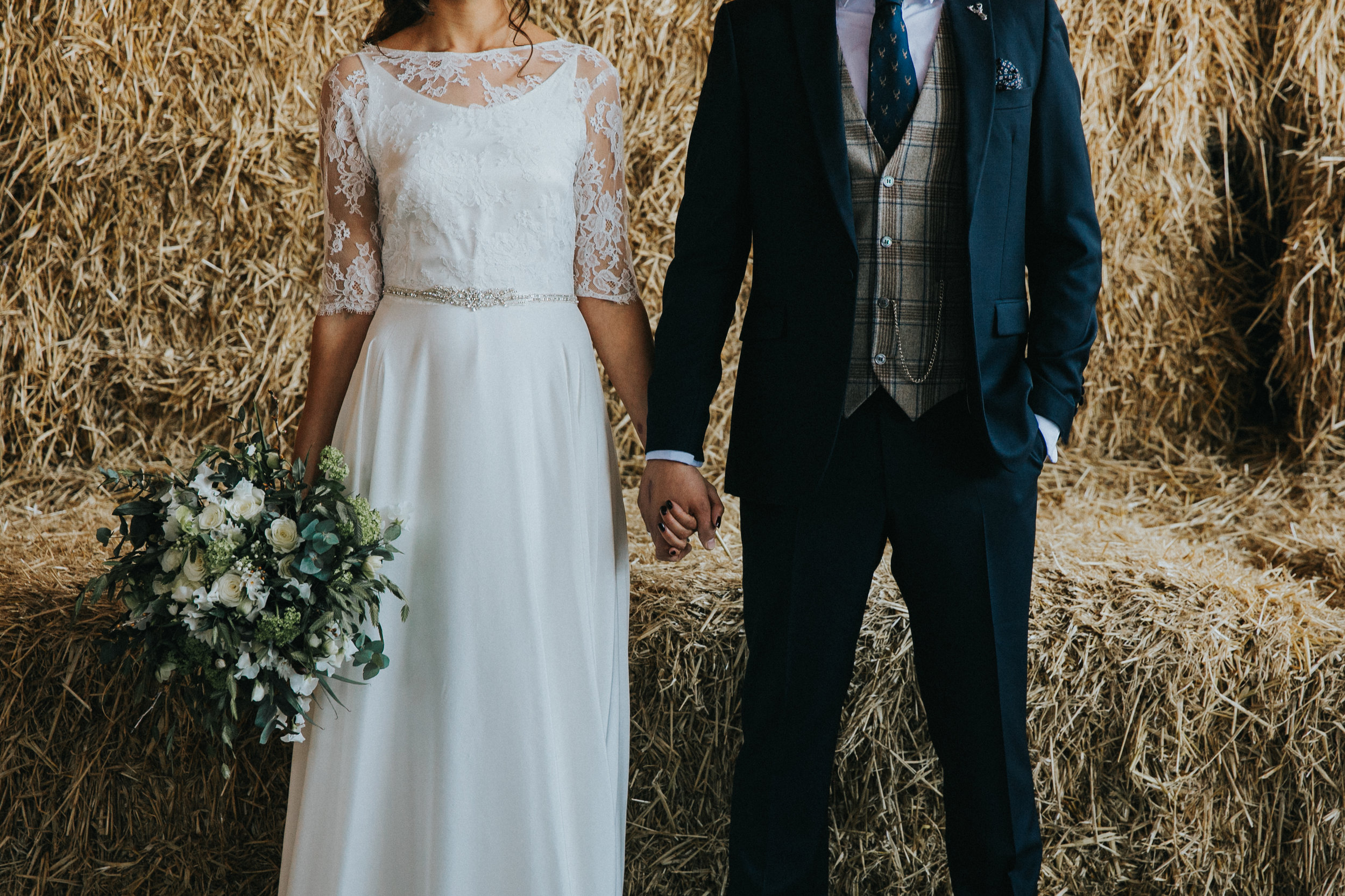 couple holding hands owen house wedding barn
