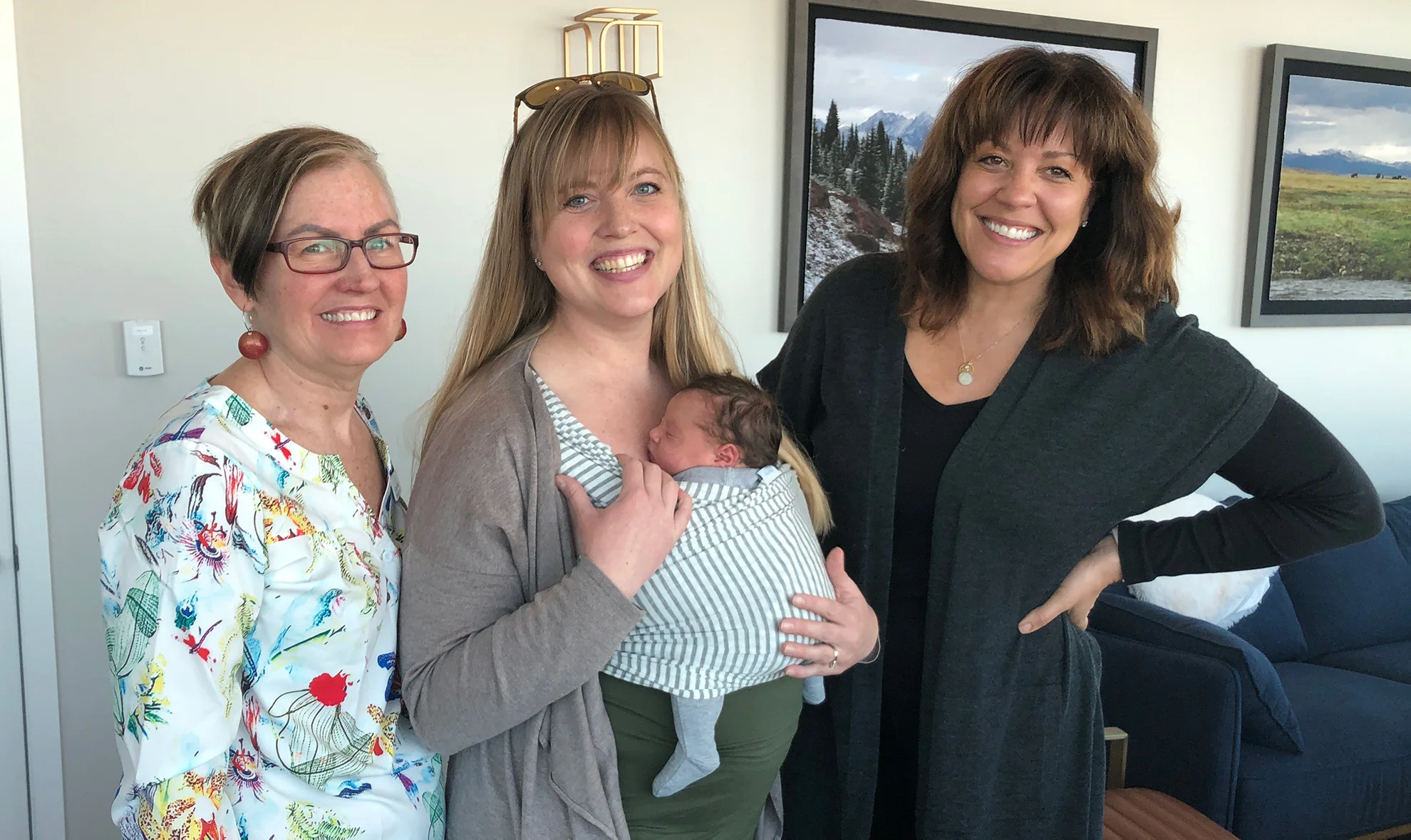 Midwife Anne and Doula Tara with a Hygge family