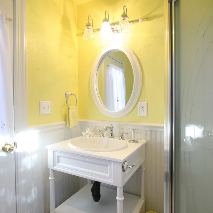 New plumbing fixtures, a little beadboard and some paint made this bathroom gorgeous.