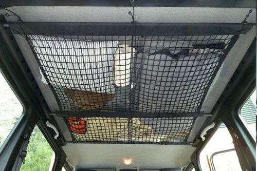 Stretchy cargo netting can be used on the roof or side panels