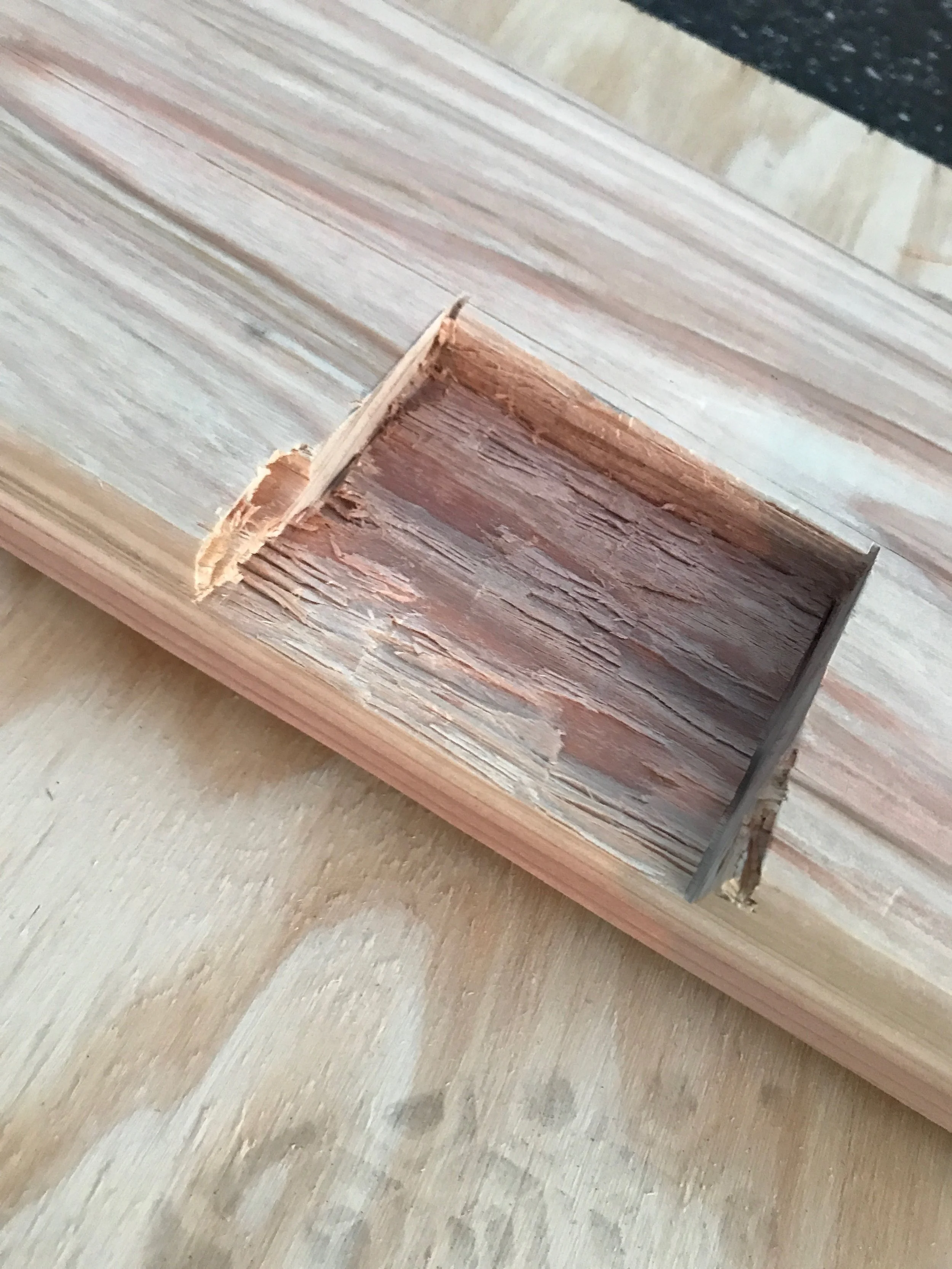Chiseled hole in wall side support rail
