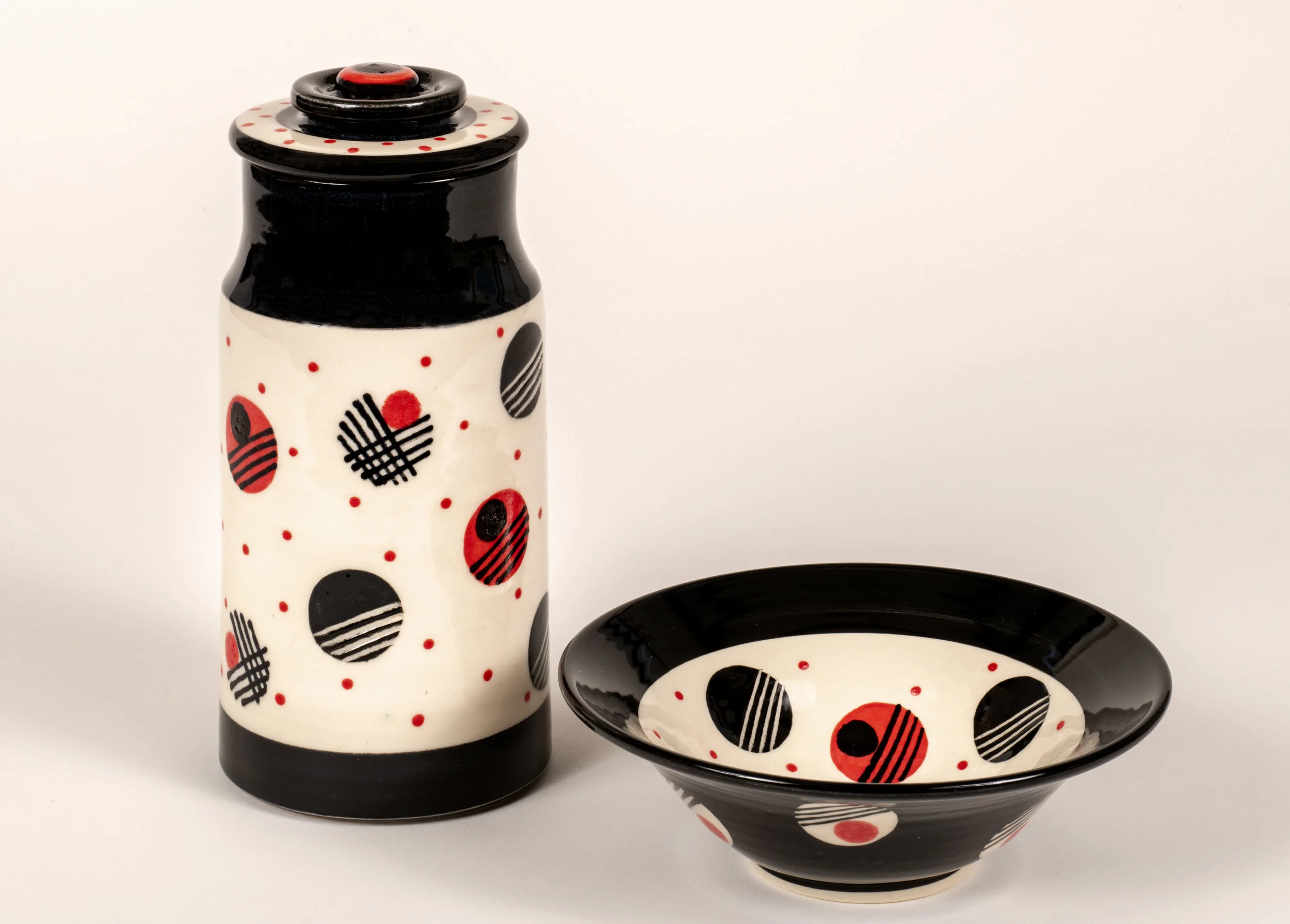 Polka Dot Covered Jar and Bowl White stoneware, coloured underglazes, transparent glaze over top Photo: Steve Farmer