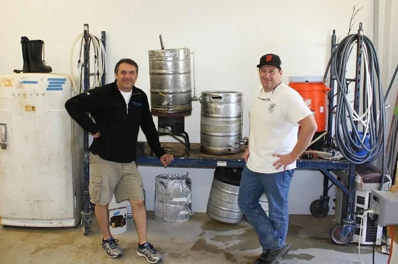 Joe and Matt with their original home brewing kit. 