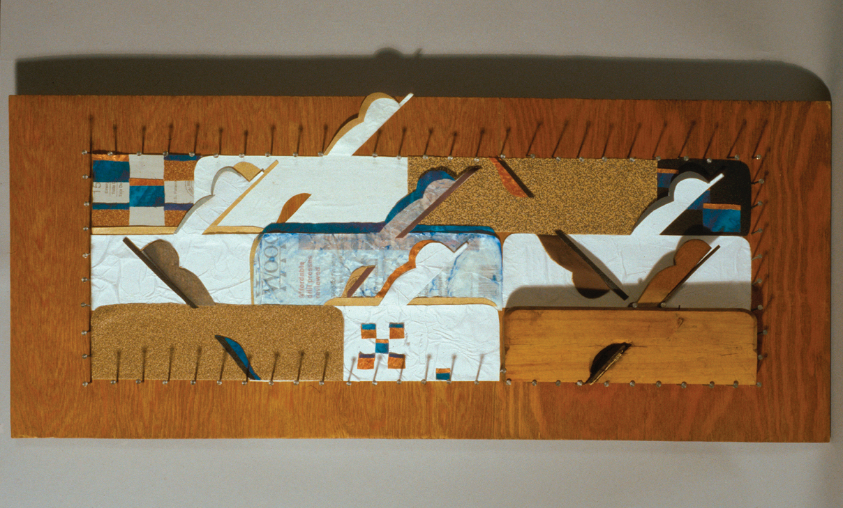 Carpenter’s Quilt 32” w x 14” h Wood quilt made with nails, paper, sandpaper, and a planer tool.