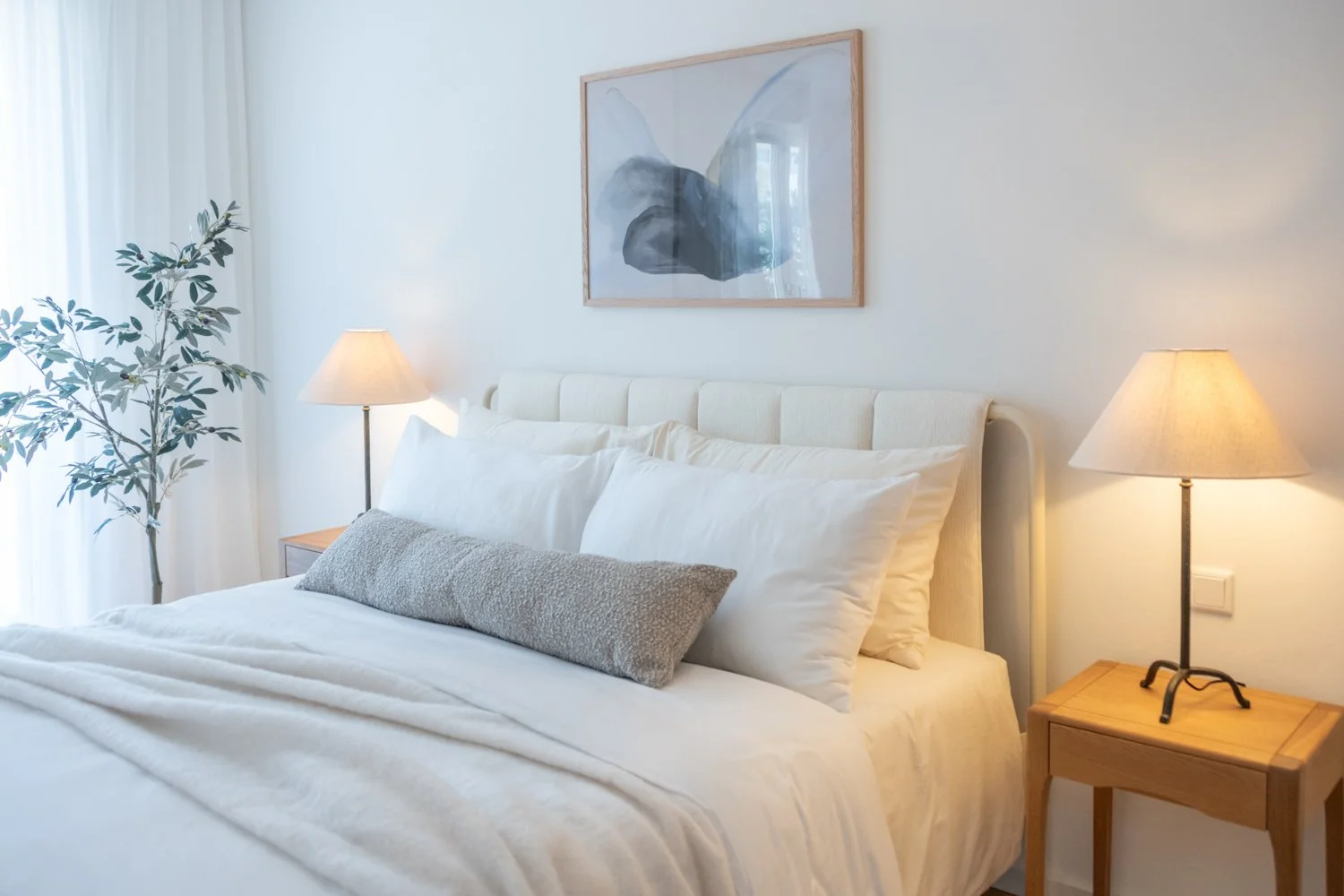 Contemporary bedroom interior showcasing modern furniture and neutral palette