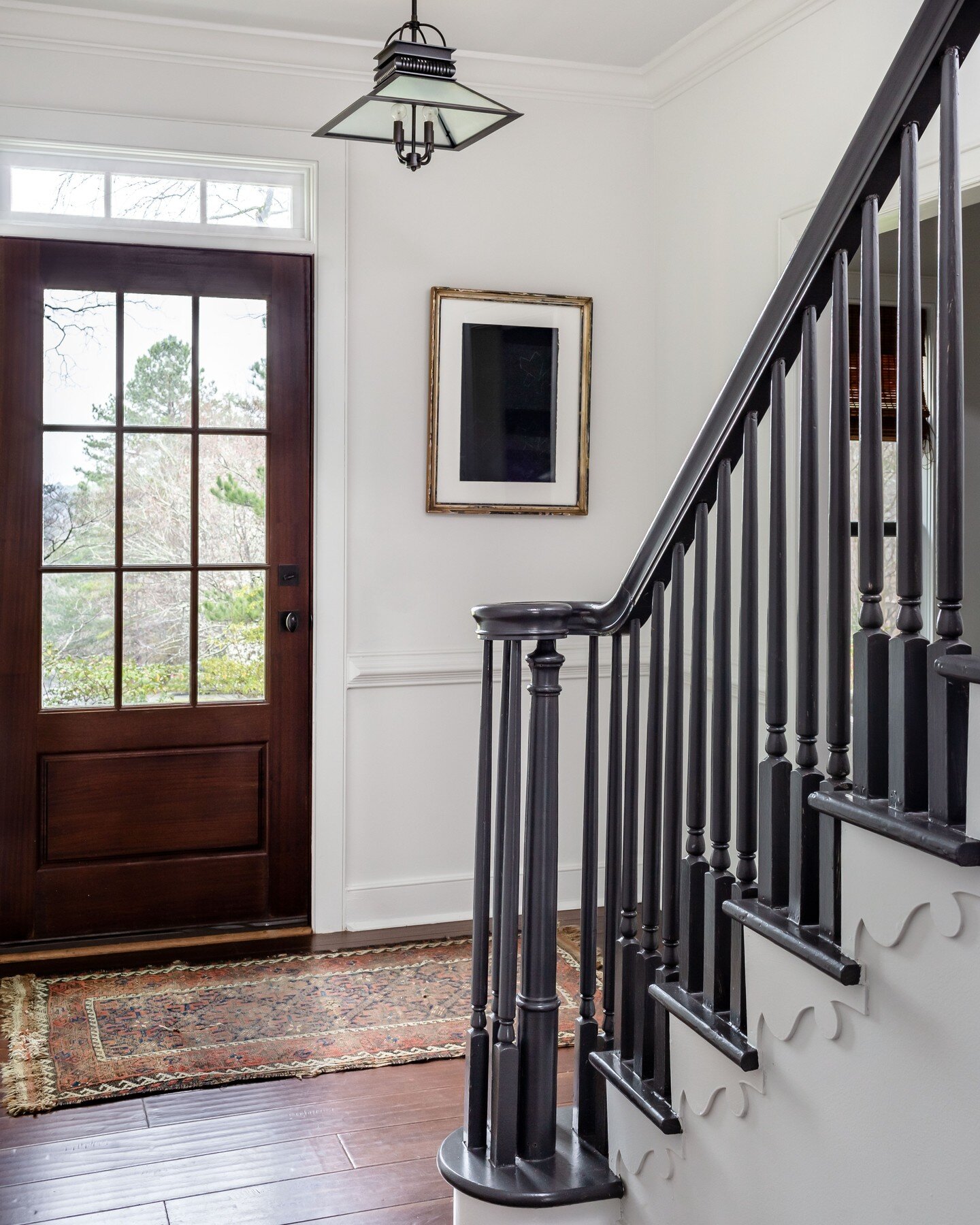 An understated foyer can still make an impactful first impression.
.
.
.
#urbanelectric #foyer #staircase #antiquerug #entryway