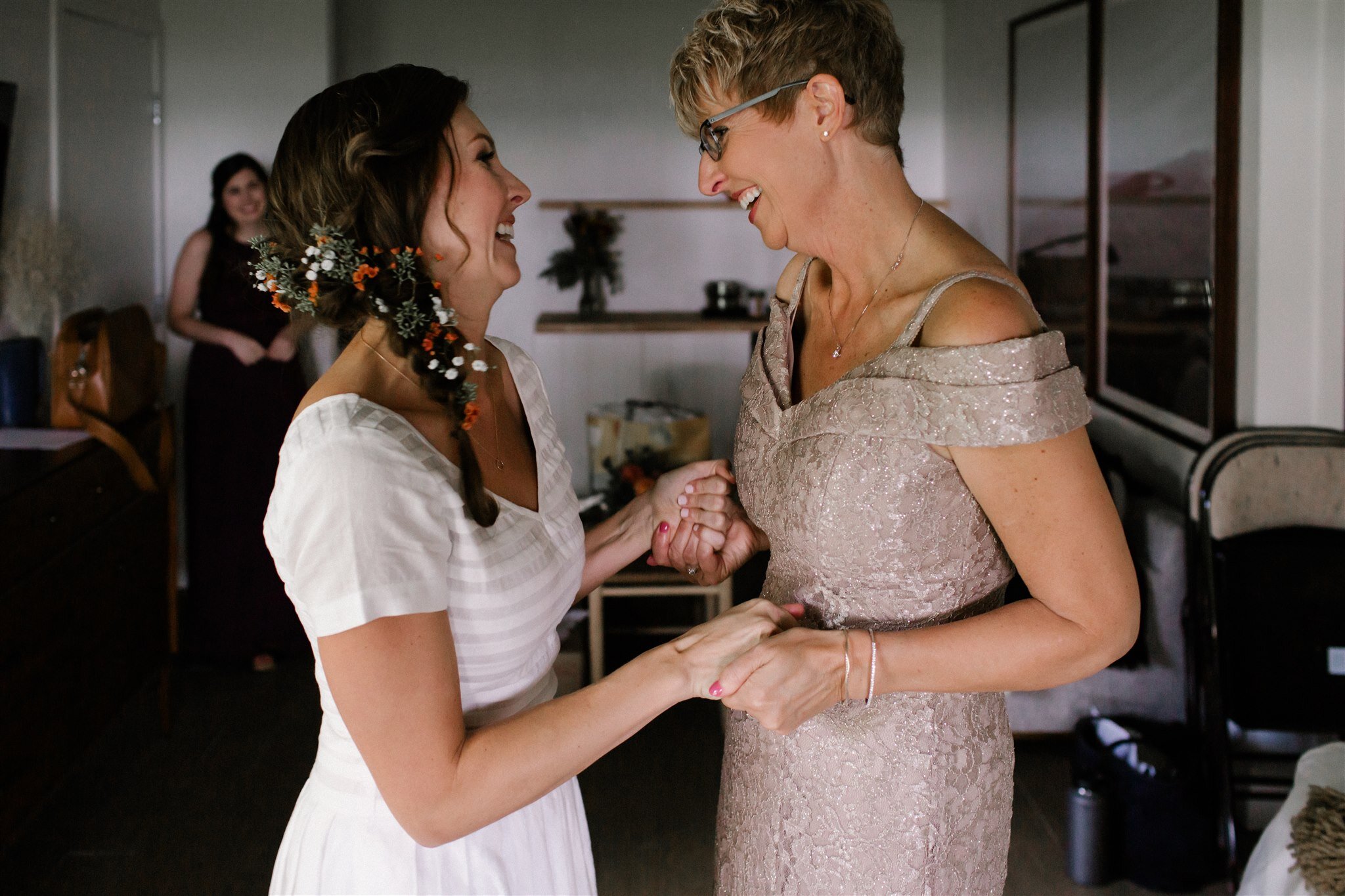 Grand Rapids Photographer Jacki Warren captures a mother with her daughter on the morning of her wedding.