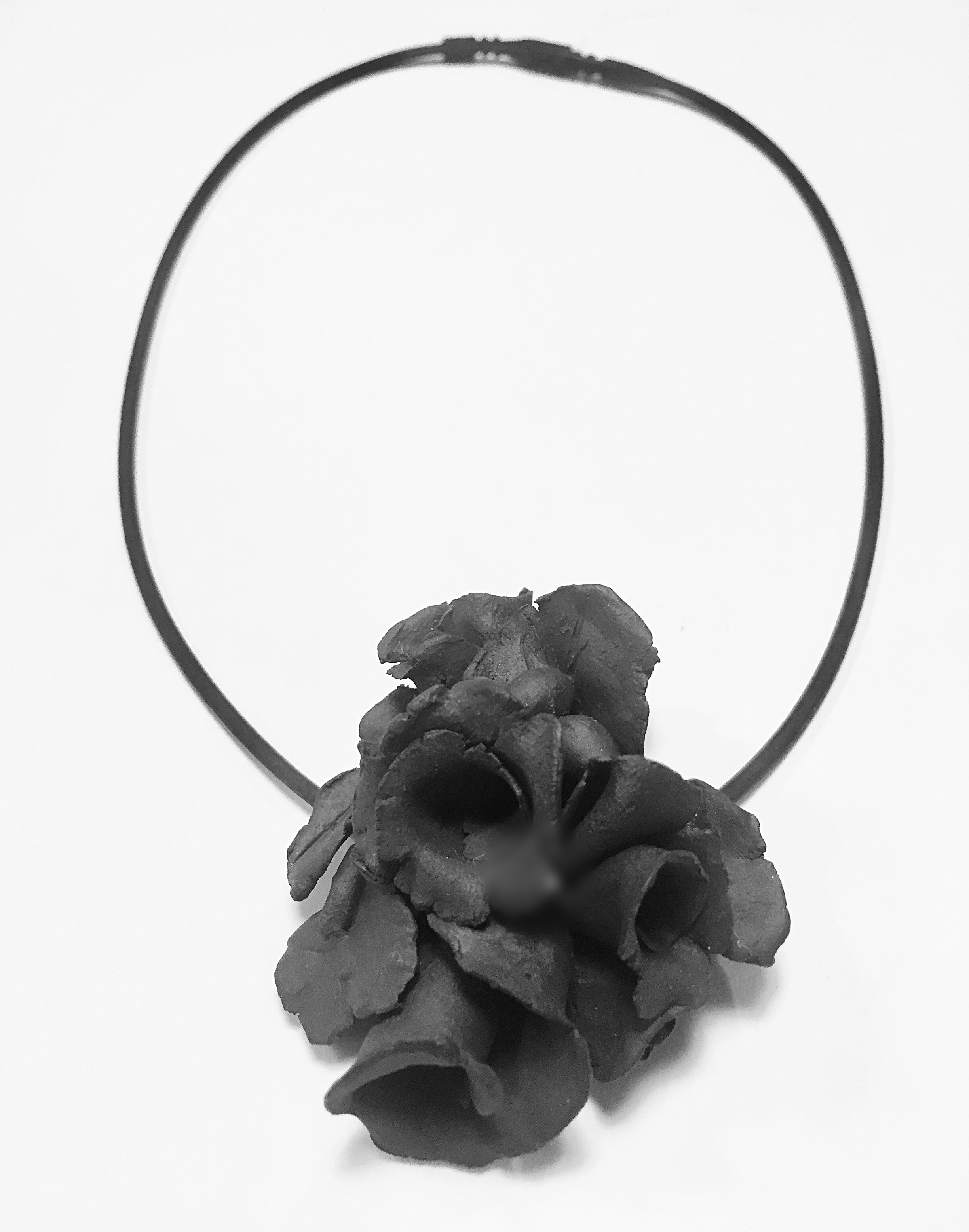 small black clay bouquet with black rubber cord