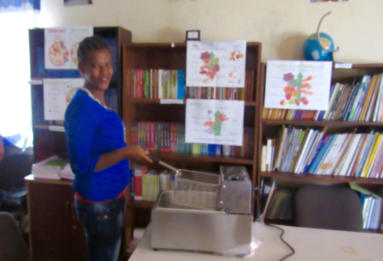 Handing over equipment to one of the livelihoods beneficiaries in Addis Ababa after the successful submittal of her business plan (1).jpg