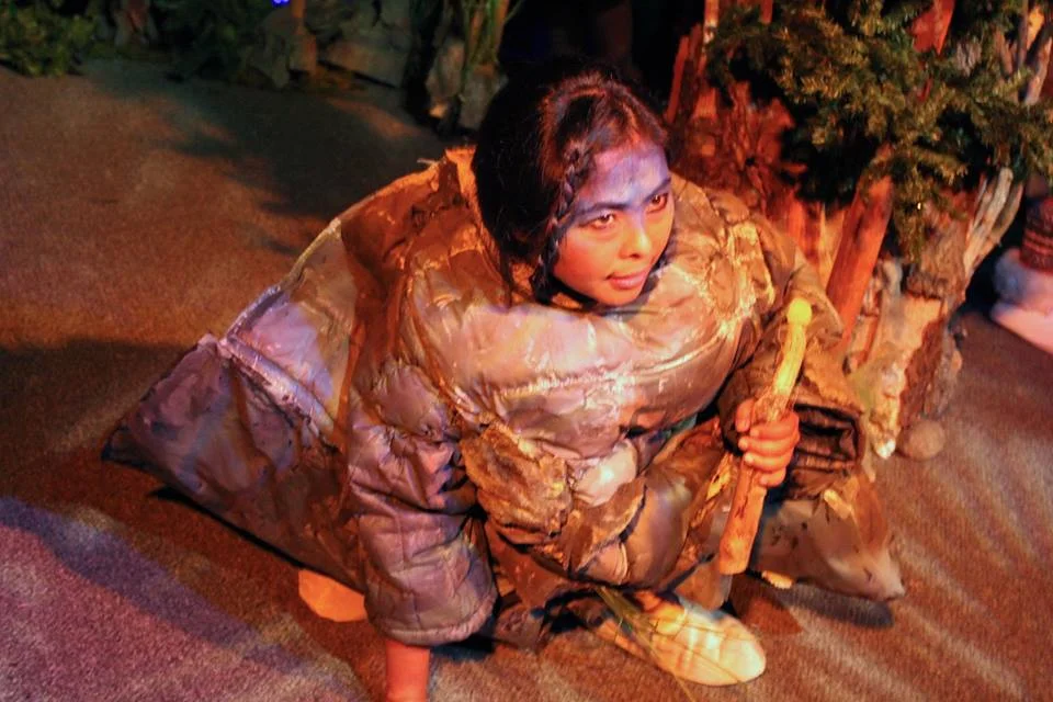 Deepali Lindblom as The Stone Coat Woman