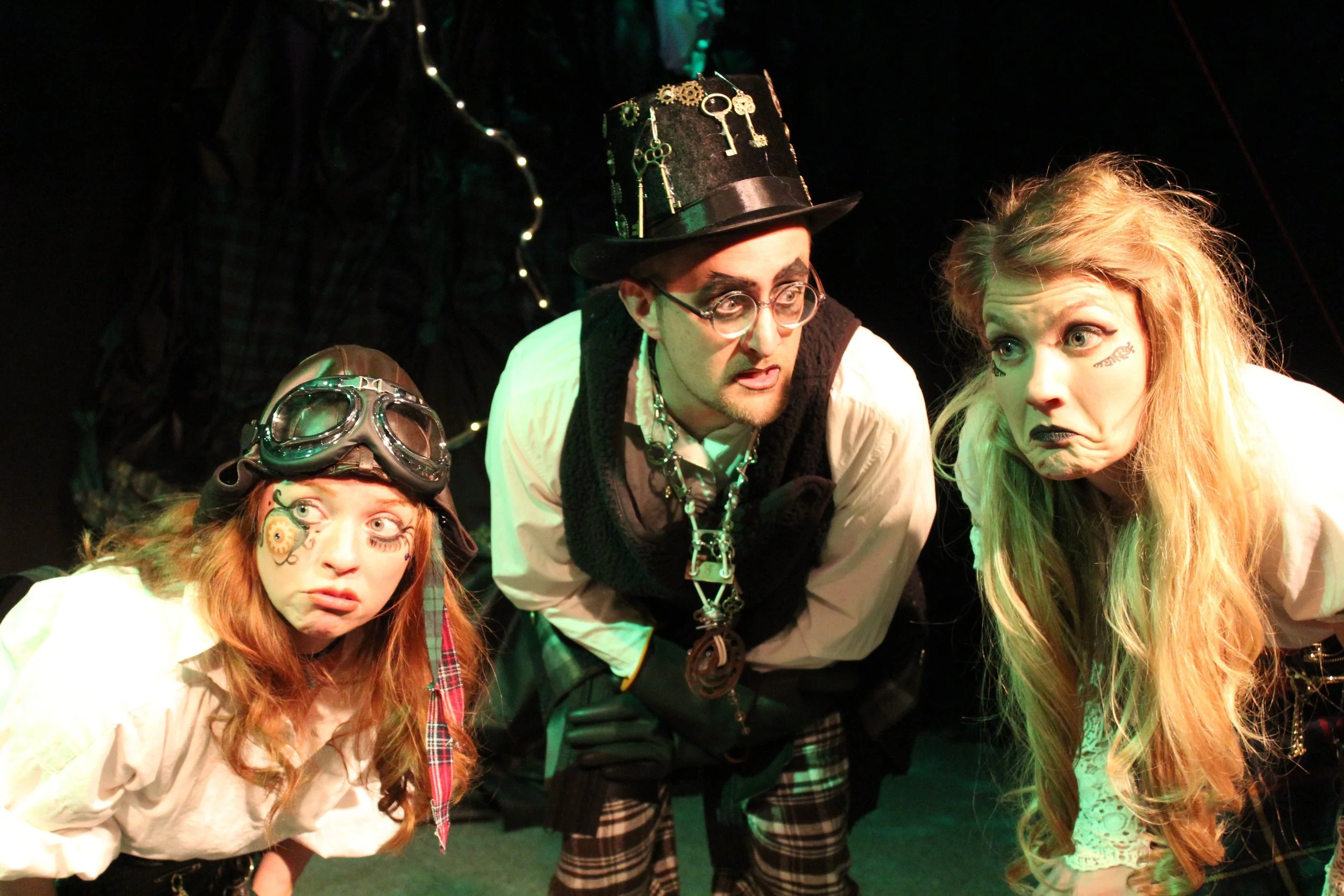 Karin Carr as The Lass, Ryan Barnett as The Mischanter, and Katie Medved as The Older Sis