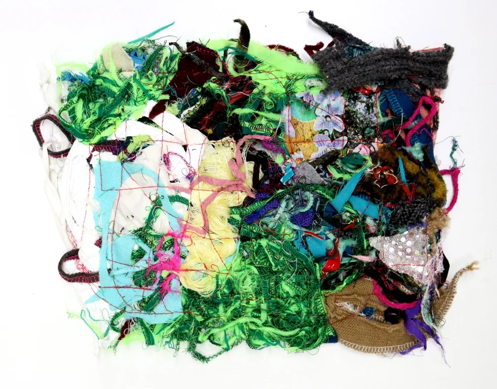 Oddment is defined as “something left over” and “something odd”, often making reference to fabric or remnants of textile materials. In my new series Oddments, I am integrating studio accretion into small scale wall works. Bits and bobs, leftovers from previous projects, debris, snippets and serger cuttings are valuable to me in term of texture, colour, shape, size and past history. With a studio practice for 13 years, this accumulation is my method of organizing, waiting for some day to make use of material that holds memory and significance. My work consists of sculptures, clothing, performance art, installation, public intervention and public art. Often developing large scale sculptures and architectural installations, the practice of creating small works is a meditation on revisiting material and utilizing undemanding construction methods. The use of PVA (Poly Vinyl Alcohol), a dissolvable substrate, is a technique of attaching odd and ends together to create a new fibre. The creative decision making required for these small scale works is invigorating my studio production. 