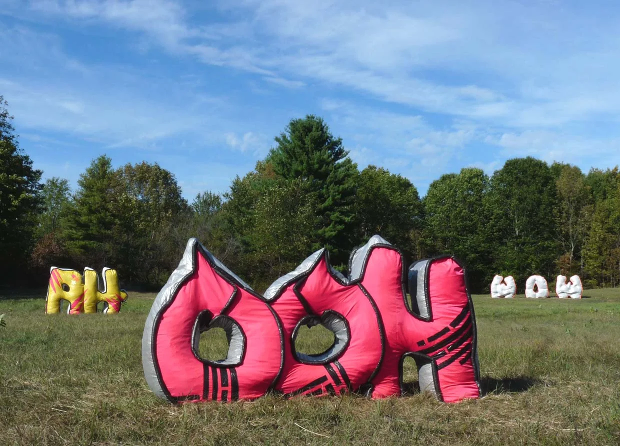 For an outdoor exhibition at Field work, I created graffiti word sculptures entitled OOH, AH, WOW. In selecting words for this exhibition, I considered the palindrome (a word that can be spelled backwards and forwards i.e.: racecar), but I also looked at letters that can be flipped vertically and be the same letter i.e.: U, T, A, O, W, H, M, X, Y, V, because the work could be be viewed from front and back. Influenced by graffitti style font and lettering, I chose the words OOH, AH, and WOW because they illicit excitement and isolate the graffiti tagging aesthetic to a bucolic environment. The sculptures were fabricated from household tarp, sewn in the studio, stuffed on-site with hay and t-bars. This work was exhibited from September 2011-April 2012. Over the 8 months in the field, the words changed alot: absorbed sun and rain, froze, sagged, faded but remained intact and upright. Please visit Field work for more about this unique exhibition space near Perth, Ontario.