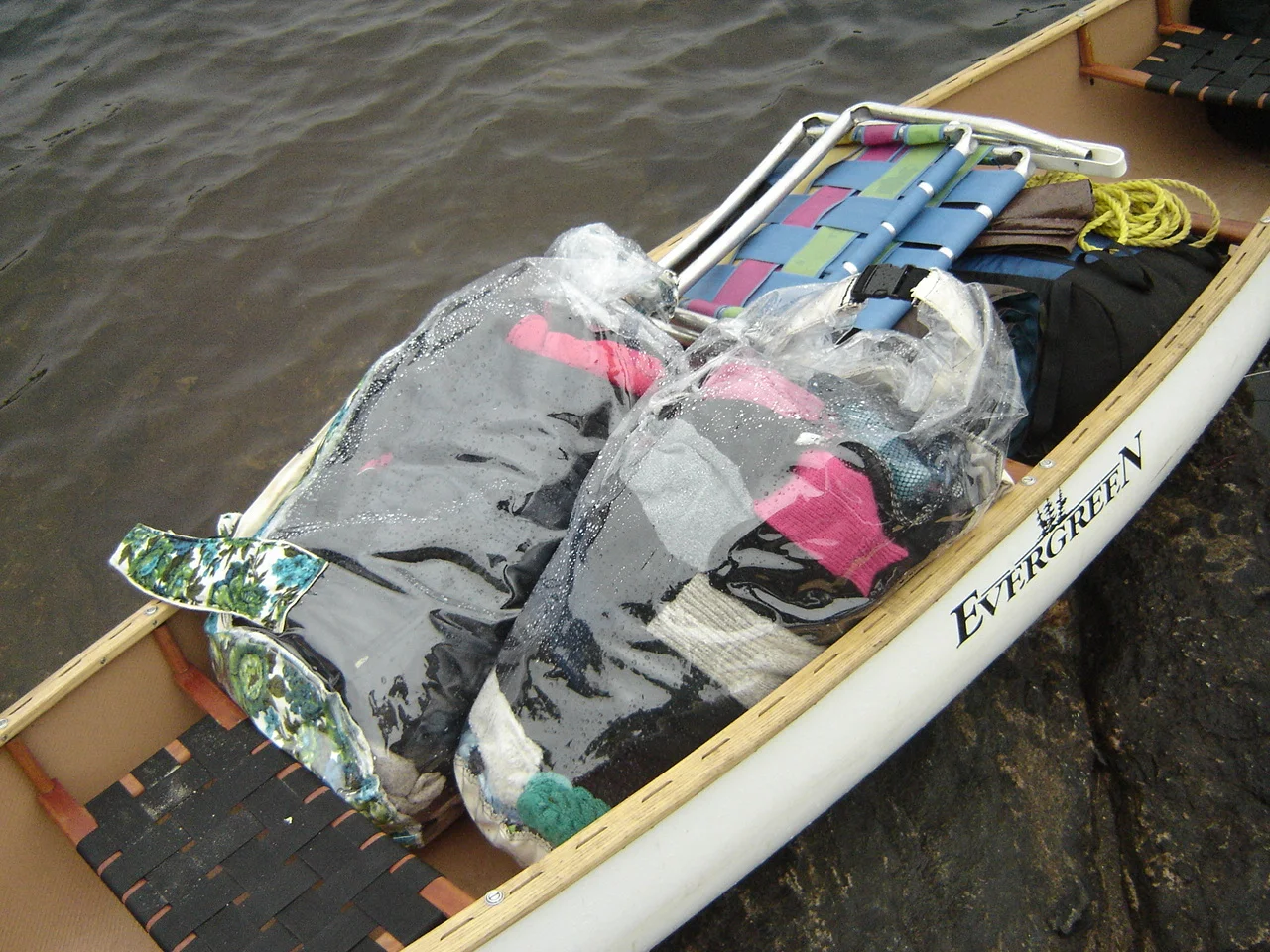  Lost Mitten Sleeping Bags 1 and 2 in canoe with custom backpacks. 