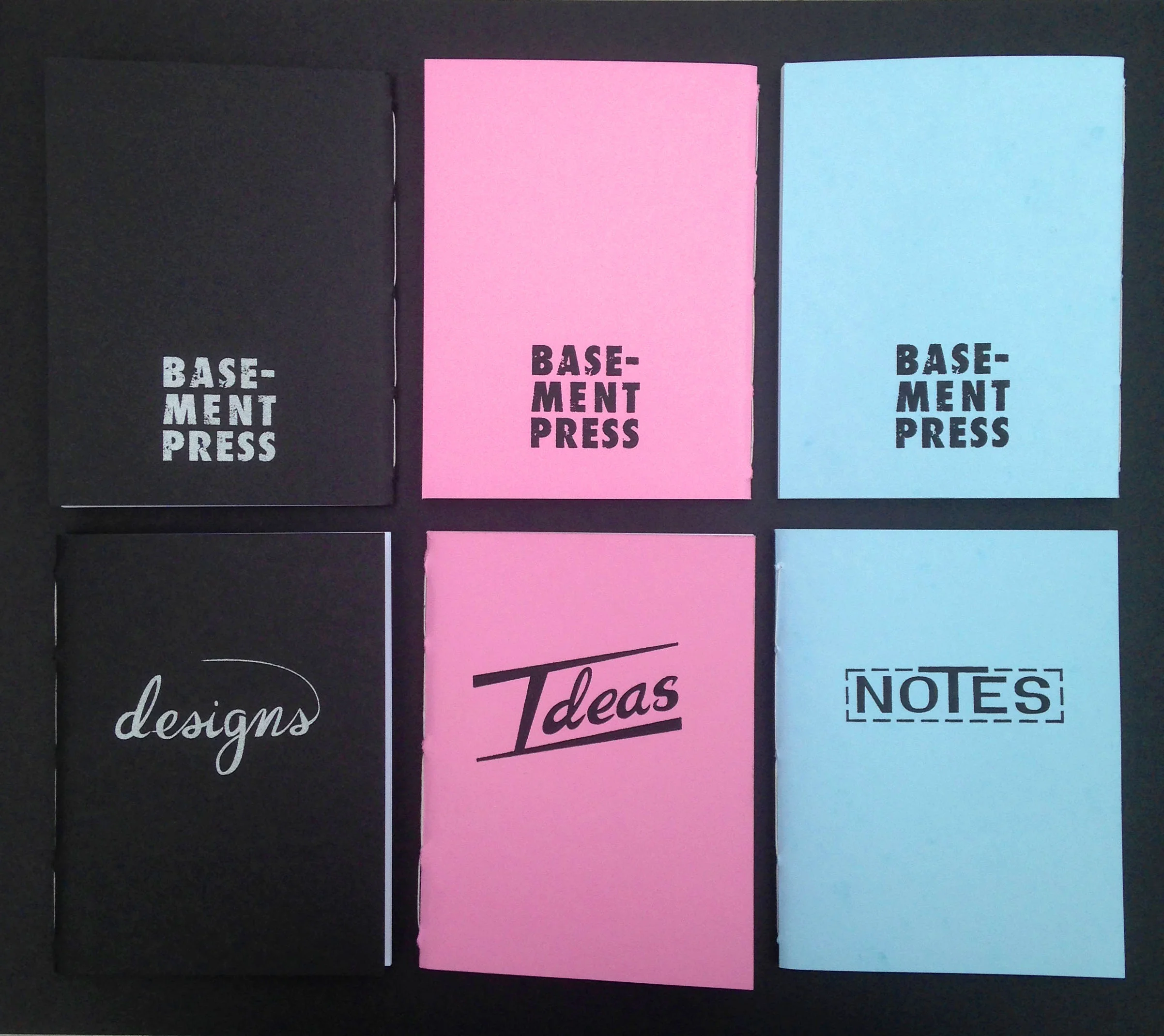 Screen-printed notebooks with older iteration of BSMT Press logo | 2015
