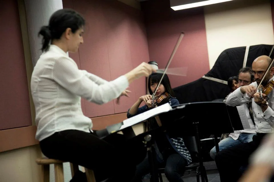 Caruso conducting her "Through My Window" overture