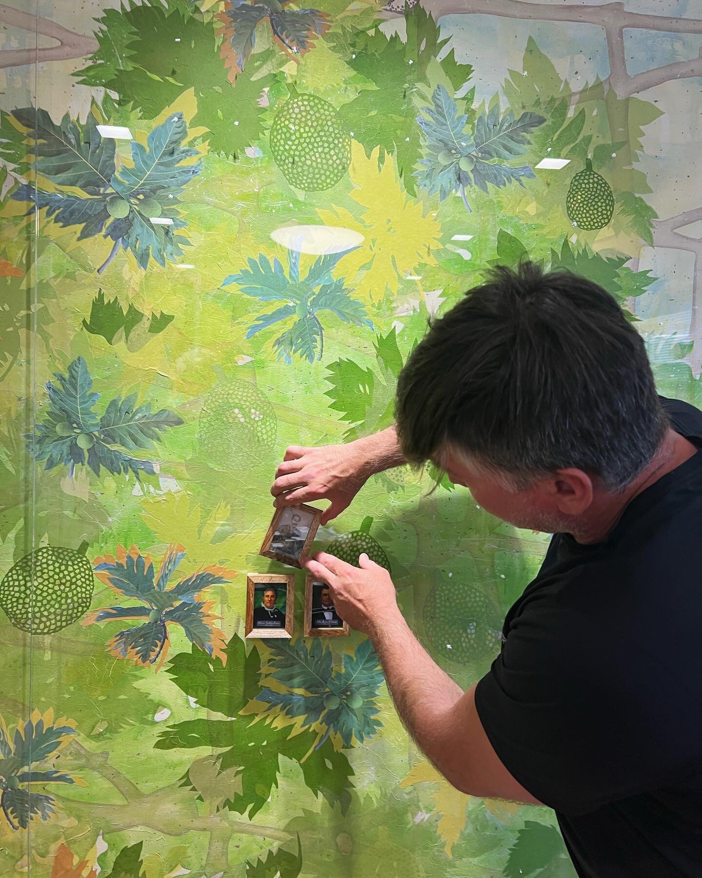 Starting to install  the family photos for the final completion of the Robinson estate trust office&rsquo;s project in partnership with interior designer Louli Yardley. Original artwork by @margoshepherdray. #artinstallationhawaii #arthandlinghawaii 