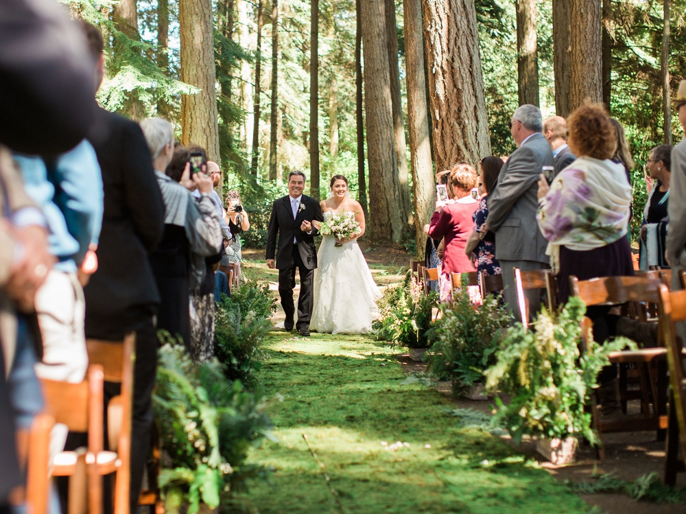  father walking daughter down the aisle in pnw wooded ceremony 