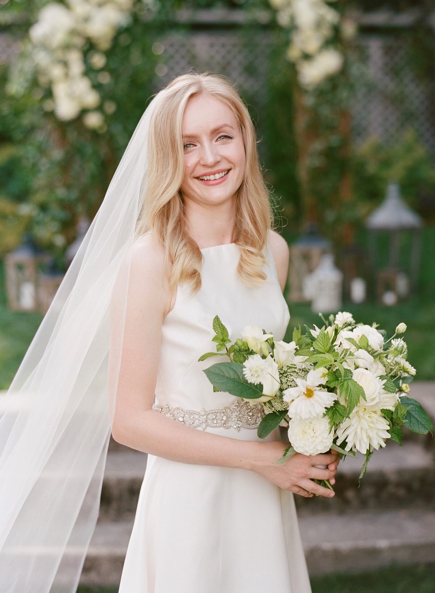 A classic bride with a white and green bridal bouquet from Seattle Wedding Florist Gather Design Company