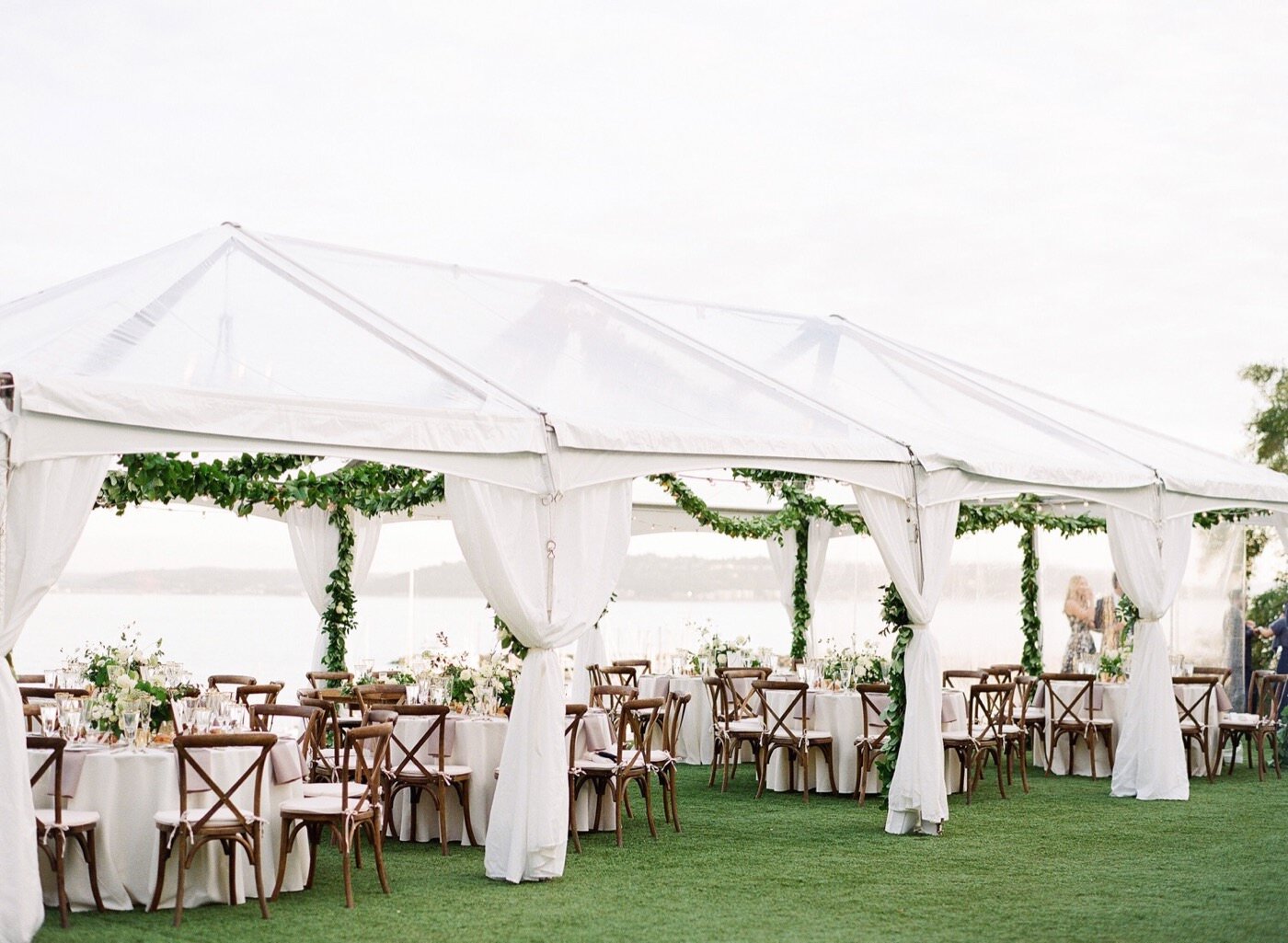 A beautiful tented reception on the front lawn of the Admiral's House in Seattle, WA