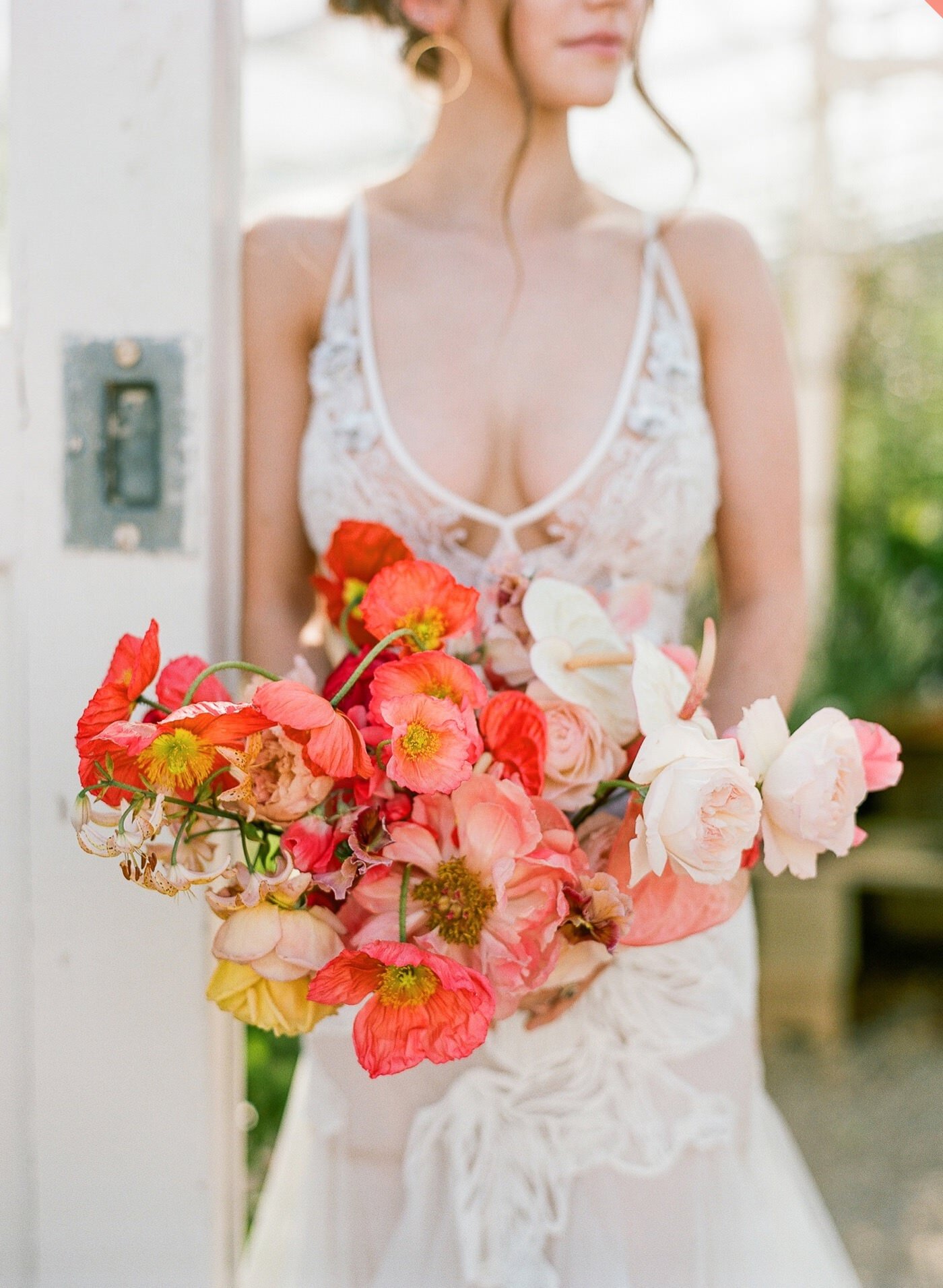 A colorful bridal bouquet with orchids from Seattle Wedding Florist Gather Design Company