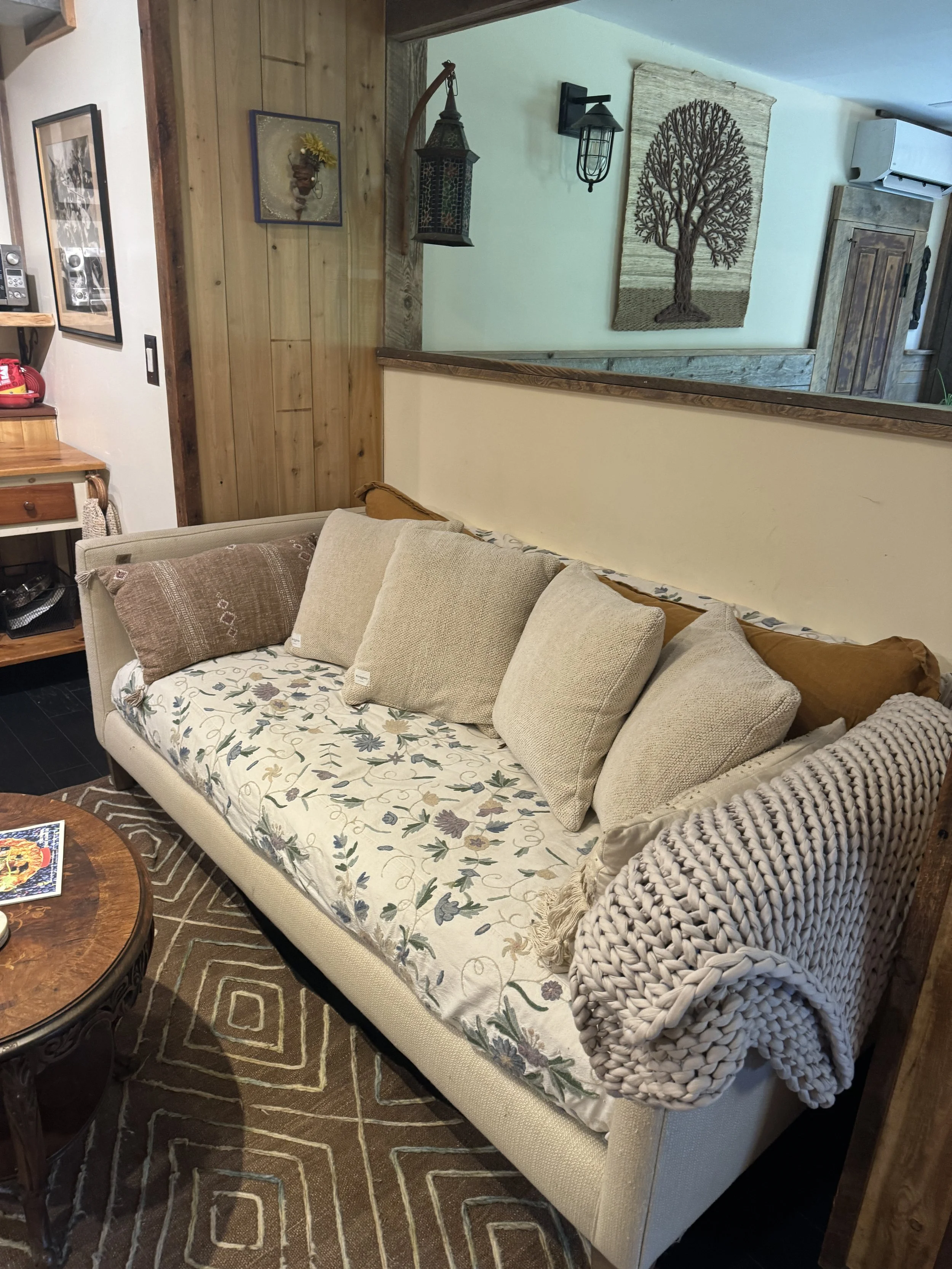 The Den Living Room with 79" television. This unit is connected to the Farmhouse and can be added to your reservation for an additional fee.