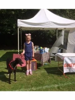 Madalaleine helping out on the stall at her school fair