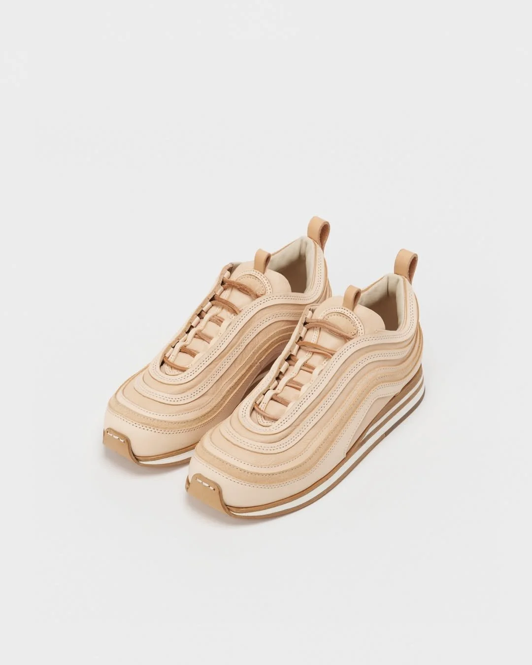 Hender Scheme Pays Homage to Nike's Air Max 97 in Latest Footwear Release