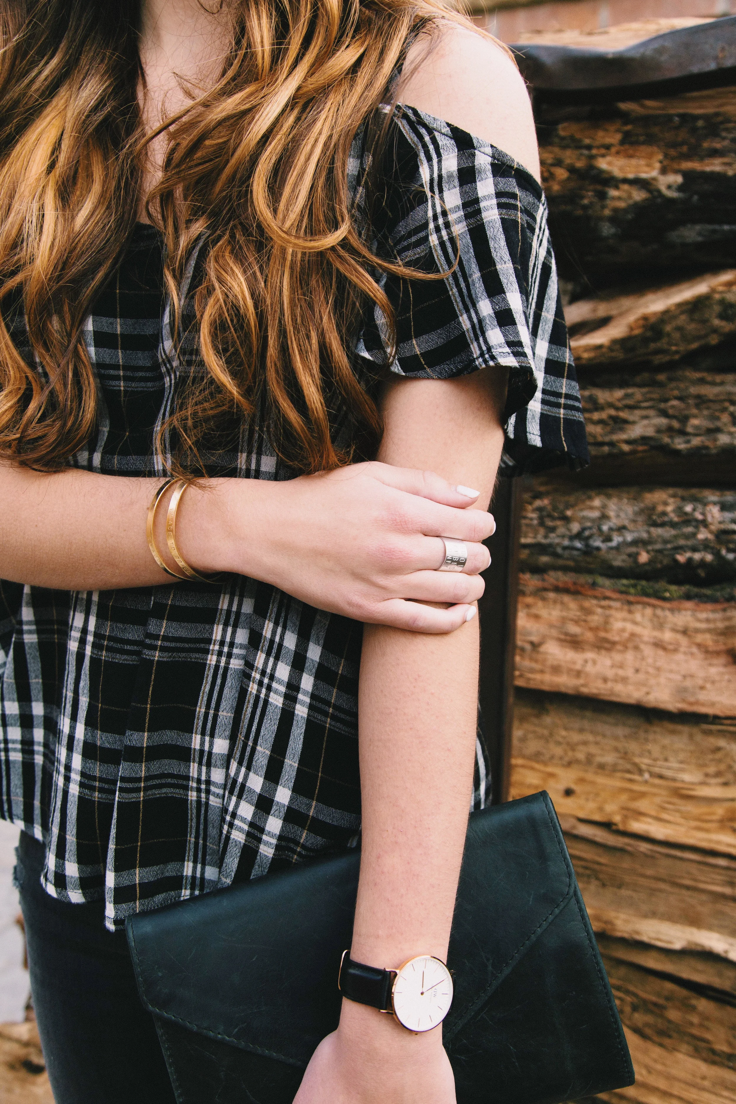 Concerning jewelry, simple and sleek are the statements of the season. Whether we're talking a stack of gold midi rings, a dainty silver necklace, or a rose gold bracelet, any pieces that appear as more of an ear-perking whisper to the outfit instead of an outfit-hogging scream are the ones that tell the season you really know what you're doing. The gold bands I'm wearing hail from a crafty Etsy shop, "Lindseyvee." Aren't they perfect? 