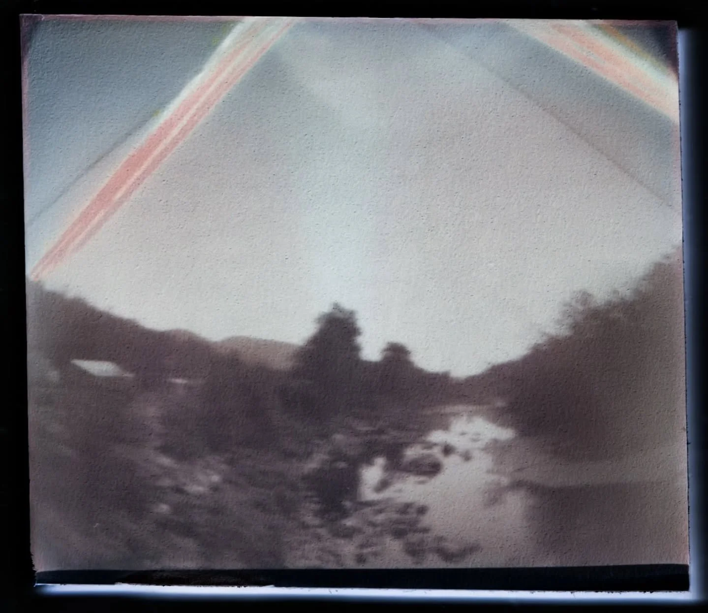 My pinhole at the ski lift got disappeared, so I'll have to hide it better. Probably safer now that they've done the mowing. Meanwhile here is a 12 day exposure of the river, what it looked like when I planted it, and what it looked like when I picke