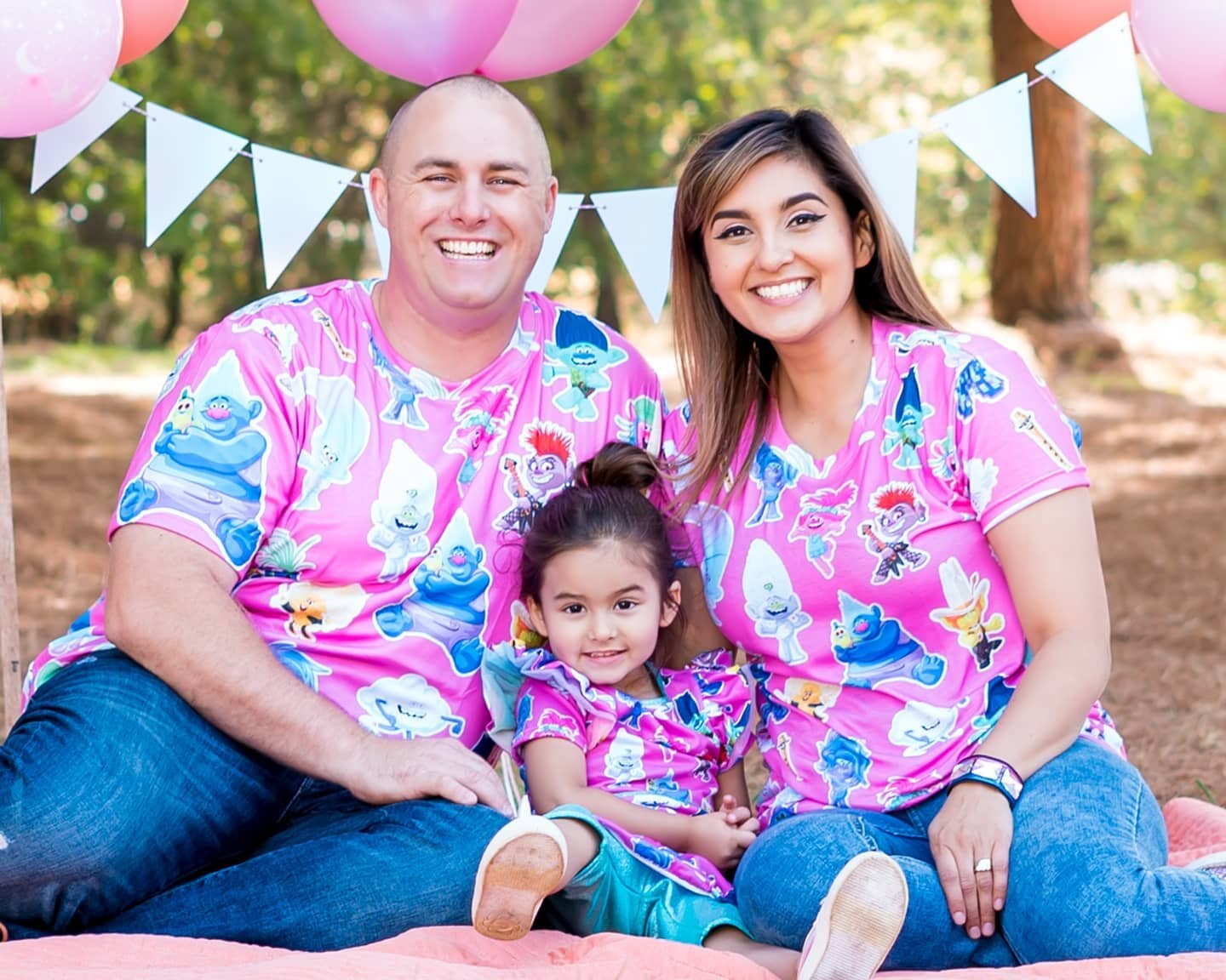 This sweet little girl turned 3 last week and we were lucky to be able to document it. Can you believe that her mom drew every single Trolls character on their shirts, got some custom fabric made, and then put together all of their outfits with her s