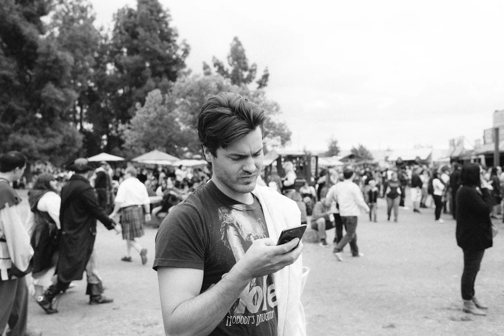 The fair tries to create of experience inspired by Elizabethan era England. Actors and vendors speak in old english and nobody accepts credit cards. James was like an alien preacher from the future with his smart phone.&nbsp;