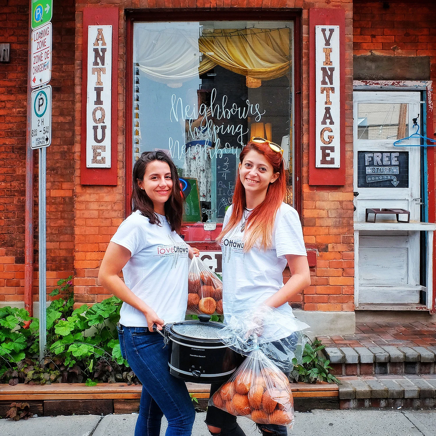 Selene and Raquel delivering Friday lunch to HighJinx.