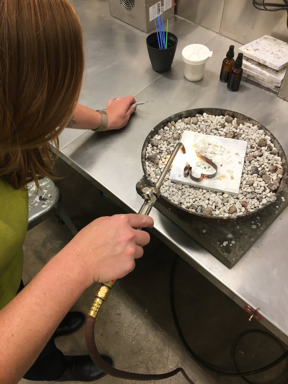  Caitlin working on a hollow form object. 