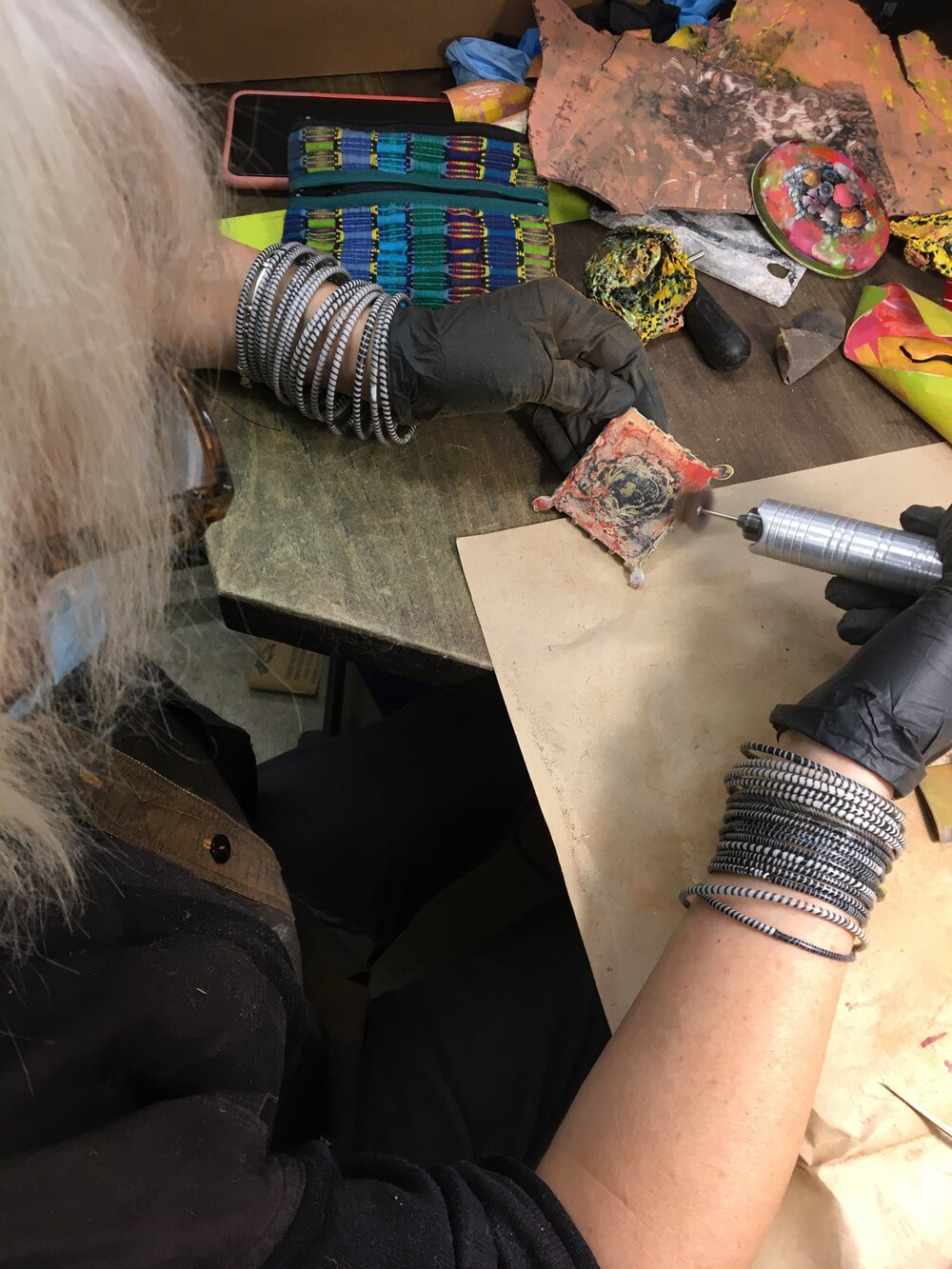  Sally hard at work transforming some old objects in the Paint+Metal workshop. 