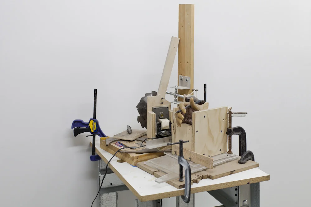 i’ll love you with all of the madness in my soul, 2013, Pen, saw blade, wax, wood, motor, and mixed media,&nbsp;5’ x 2’ x 2′