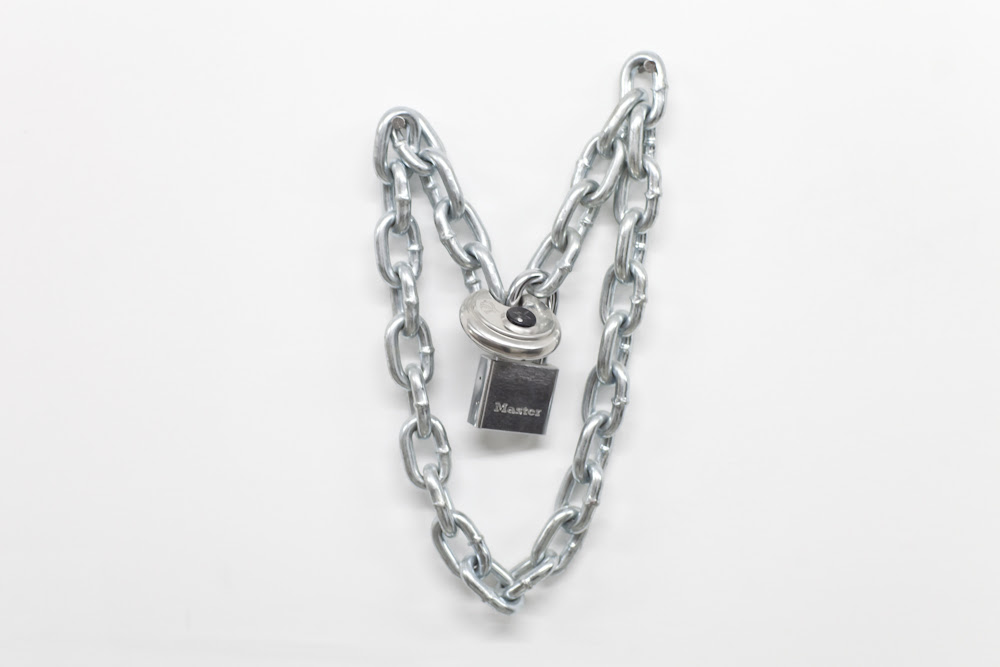 i’ve had kisses that make judas seem sincere…, 2013, Chain and padlocks, 16 x 16 x 4 inches