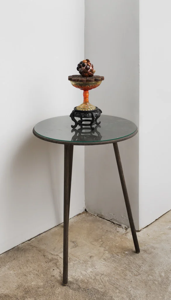 Super Influenza, 2014, Found objects, fabric, leather buttons, 8 x 4 x 4 inches