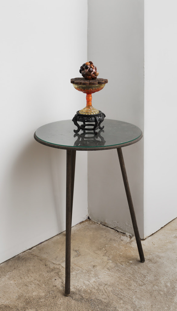 Super Influenza , 2014, Found objects, fabric, leather buttons, 8 x 4 x 4 inches