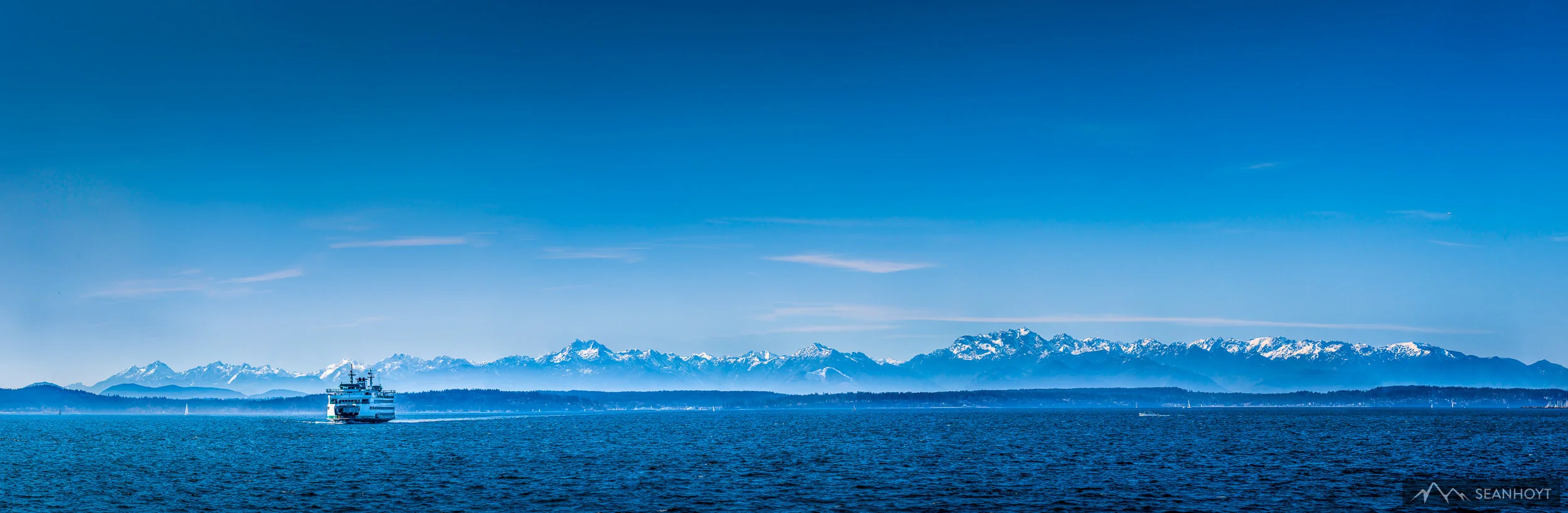 seattle ferry coming back from olympic mountains