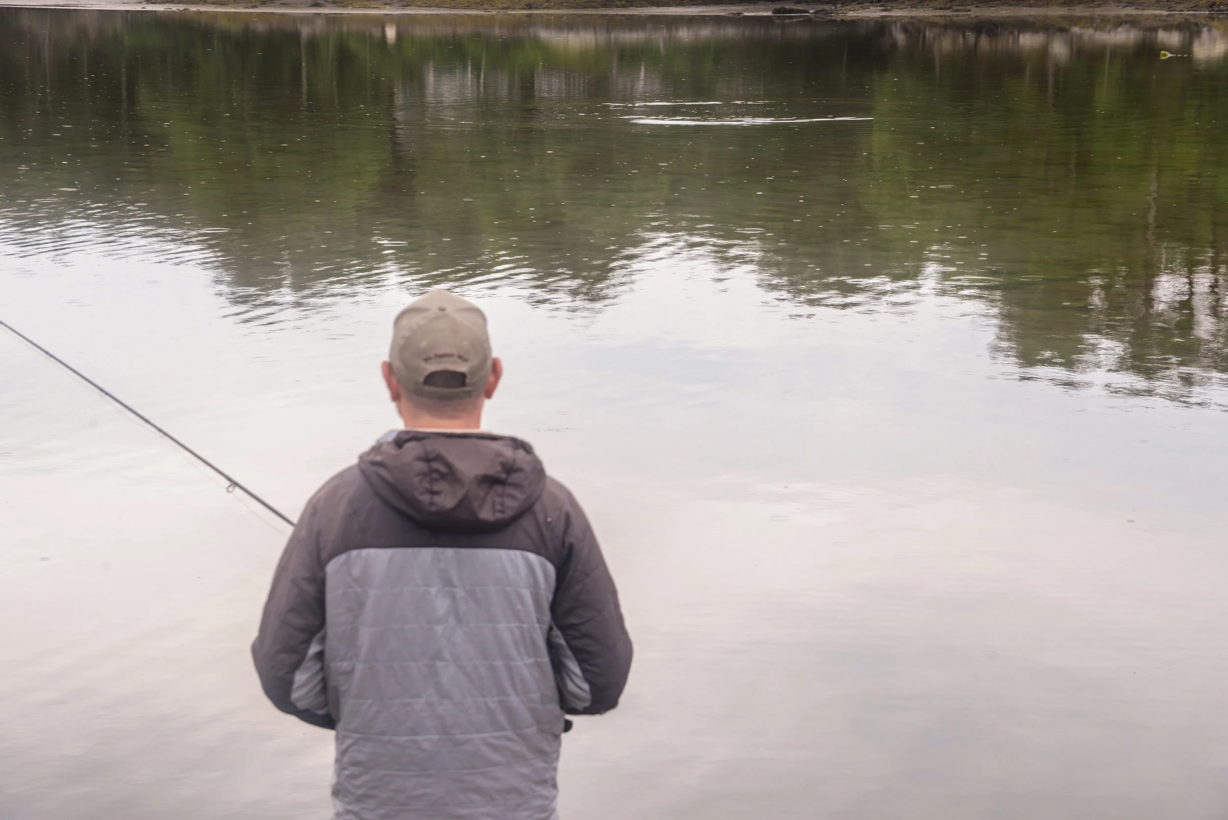 Jon Tregea spots a waking fish at the boat's 12 o'clock and analyzes it's direction and mood, patiently awaiting the right moment for the shot.&nbsp;&nbsp;Photo: Kyle Schaefer
