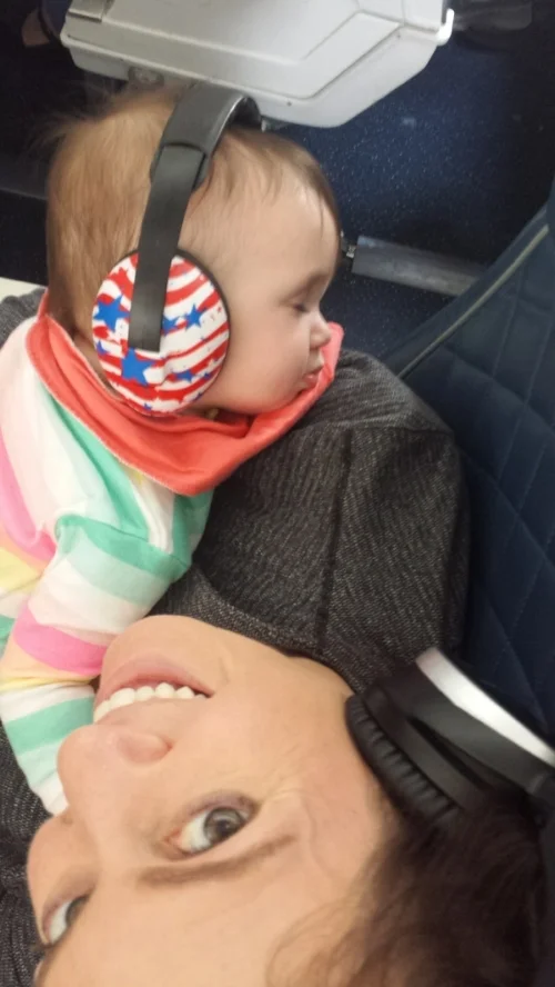Cross Country Flying FIrst Class Seat on Mommy's Lap