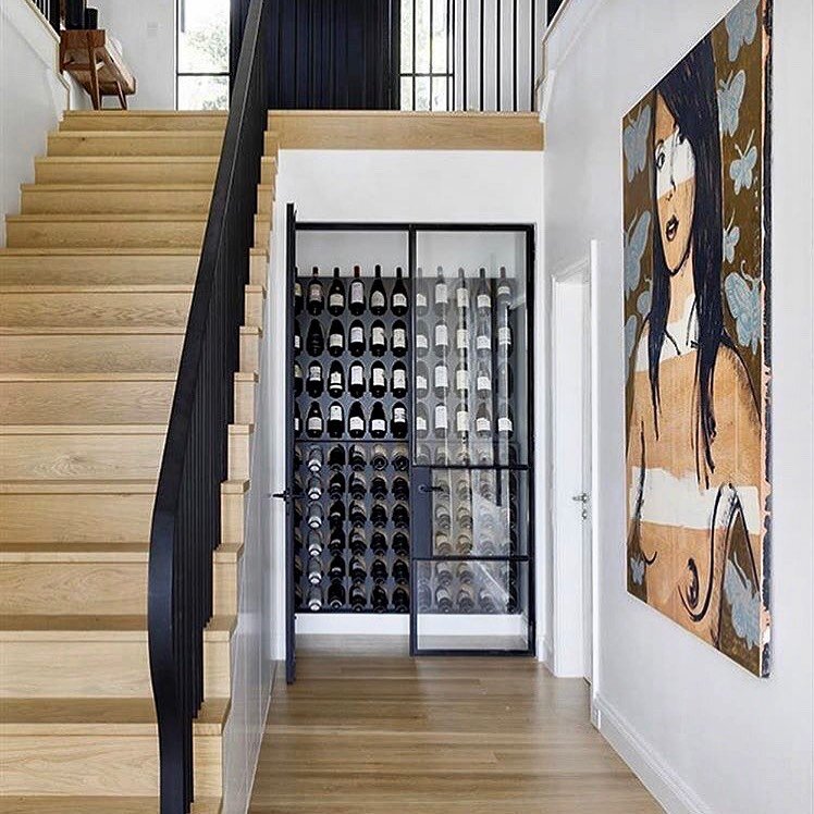 With this cool wine cabinet how can it not be a happy Friday? Love your work @steelwindowdesign 🖤. #steelwindowdesign #winecellargoals #happyfriday #winetime #cheerstotheweekend #newhomebuilder #steelwindows #havenconstruction #havencustomhomes #eth