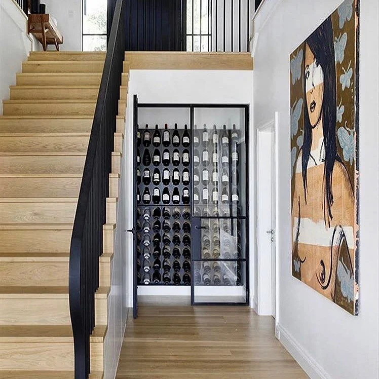 With this cool wine cabinet how can it not be a happy Friday? Love your work @steelwindowdesign 🖤. #steelwindowdesign #winecellargoals #happyfriday #winetime #cheerstotheweekend #newhomebuilder #steelwindows #havenconstruction #havencustomhomes #eth