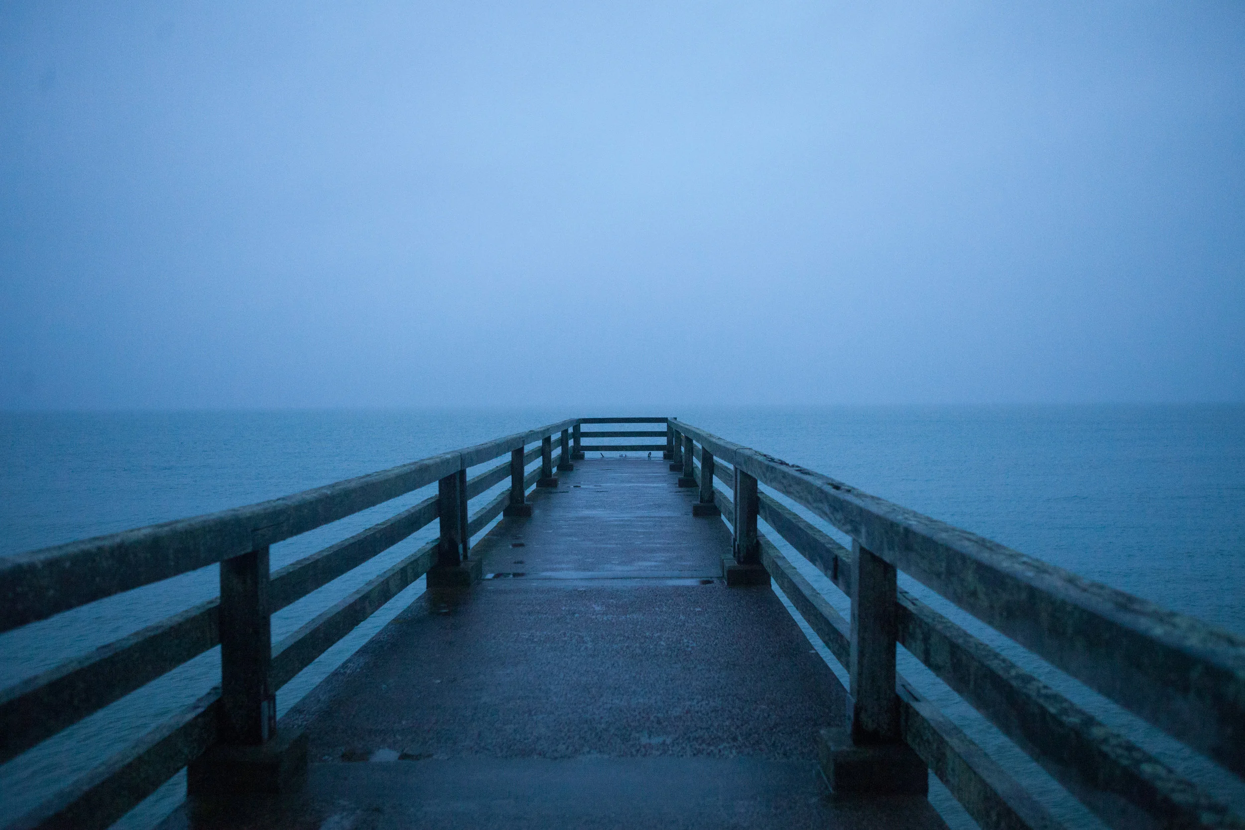 Omaha Beach, Vierville-sur-Mer: Daybreak just after the tide came in on a modern observation pier built out from a wrecked Mulberry harbor section. We were hoping to see beach as it might have looked at the time of the landings but the tides didn’t work in our favor.
