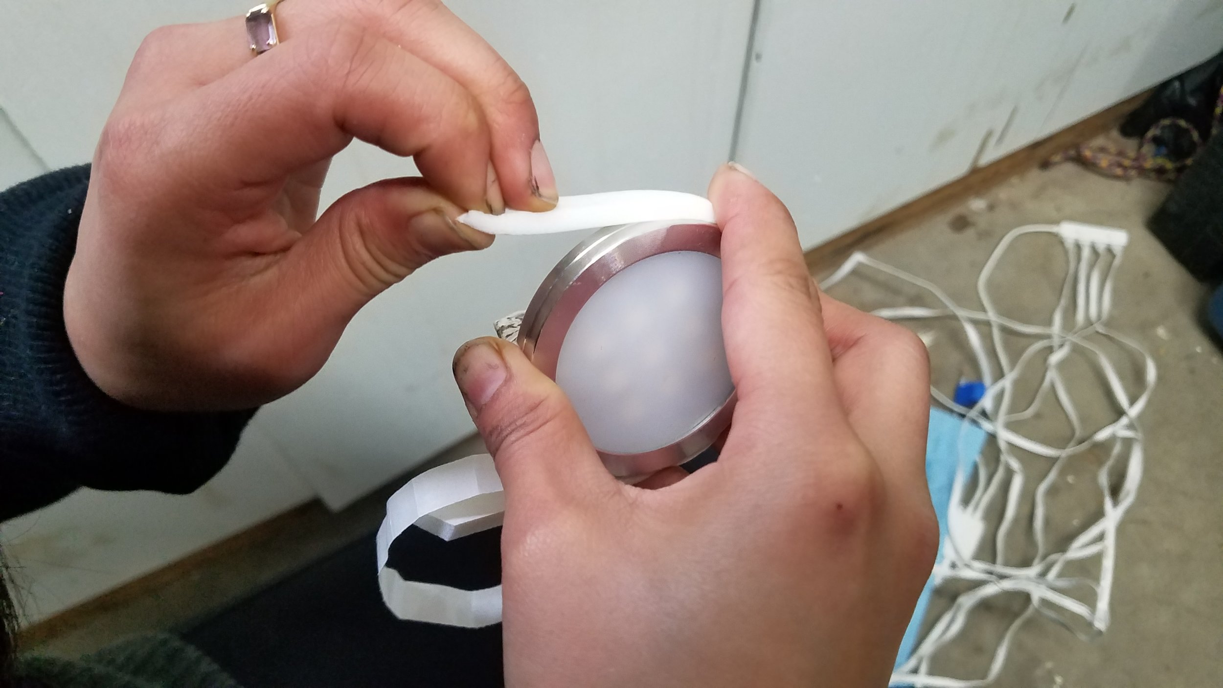 The key to wrapping is that it can't be too tight or too loose. We used Gorilla tape to tape the ends together. Wash your hands before working with white weather stripping!