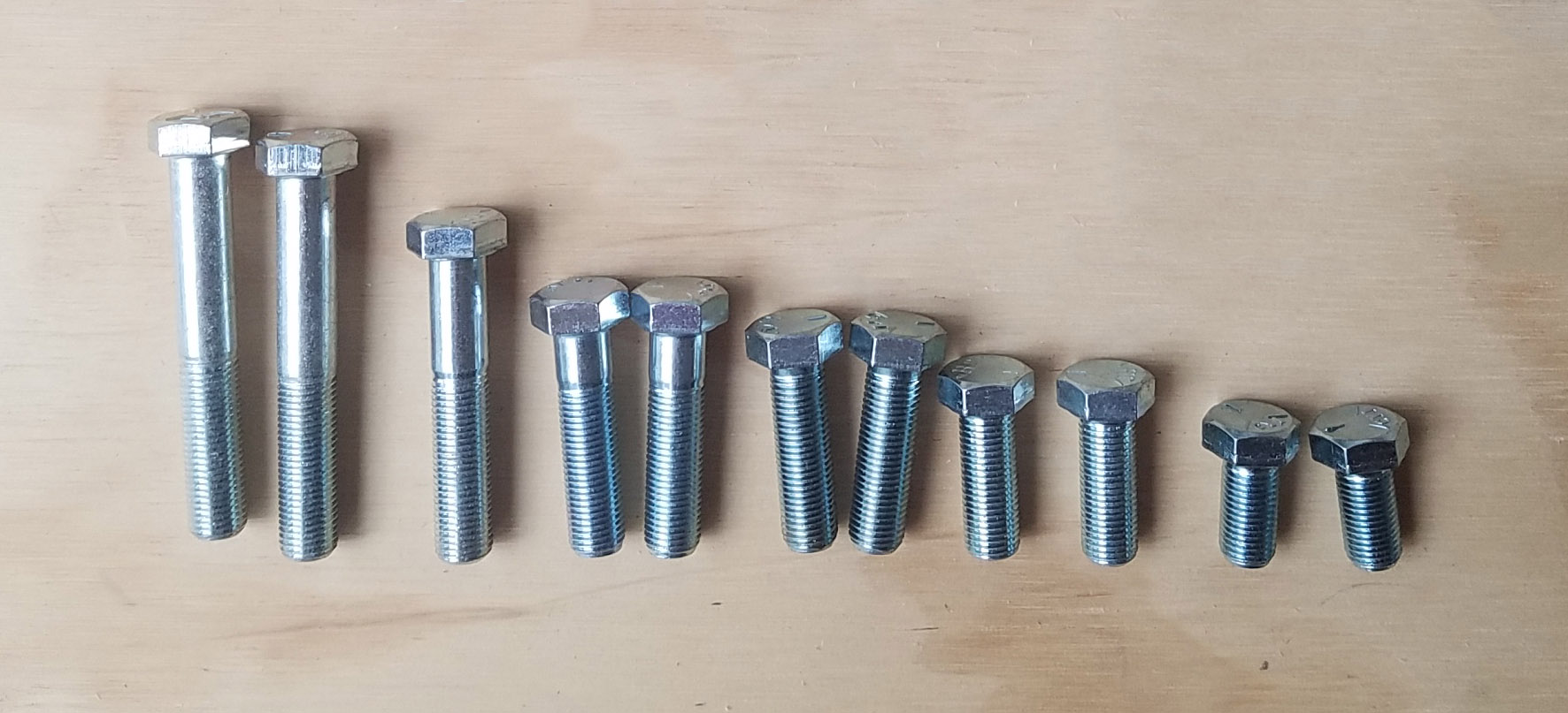 Tip: If you're going to make a lot of custom brackets like we did, buy at least two of every length of 3/8” fine-threaded bolt you can find (also known as 3/8 - 24), and return what you don’t use when you're done. We were surprised by how many times we needed a slightly longer or shorter bolt.