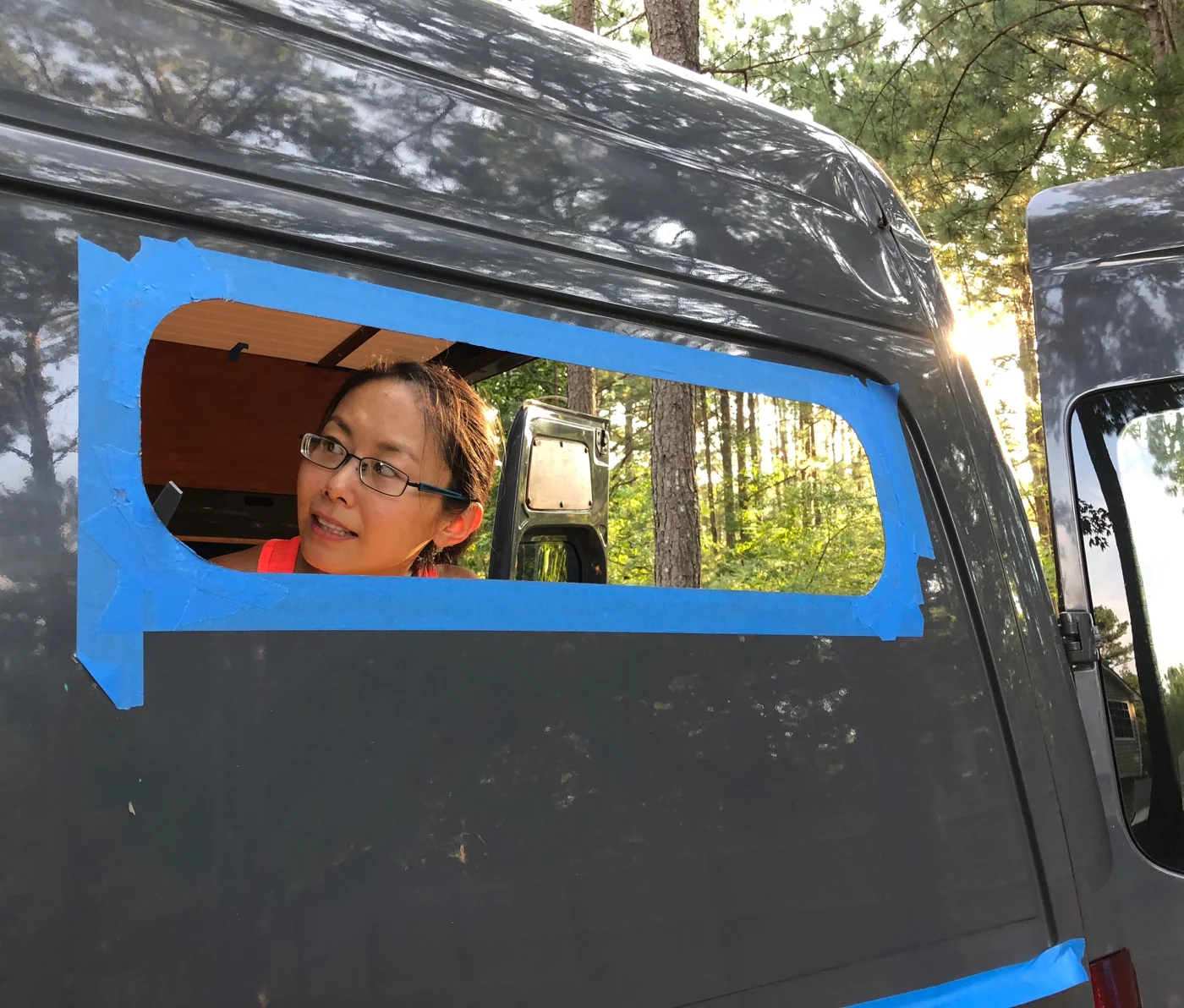 Shelly faces the reality. We made another giant hole in our van.